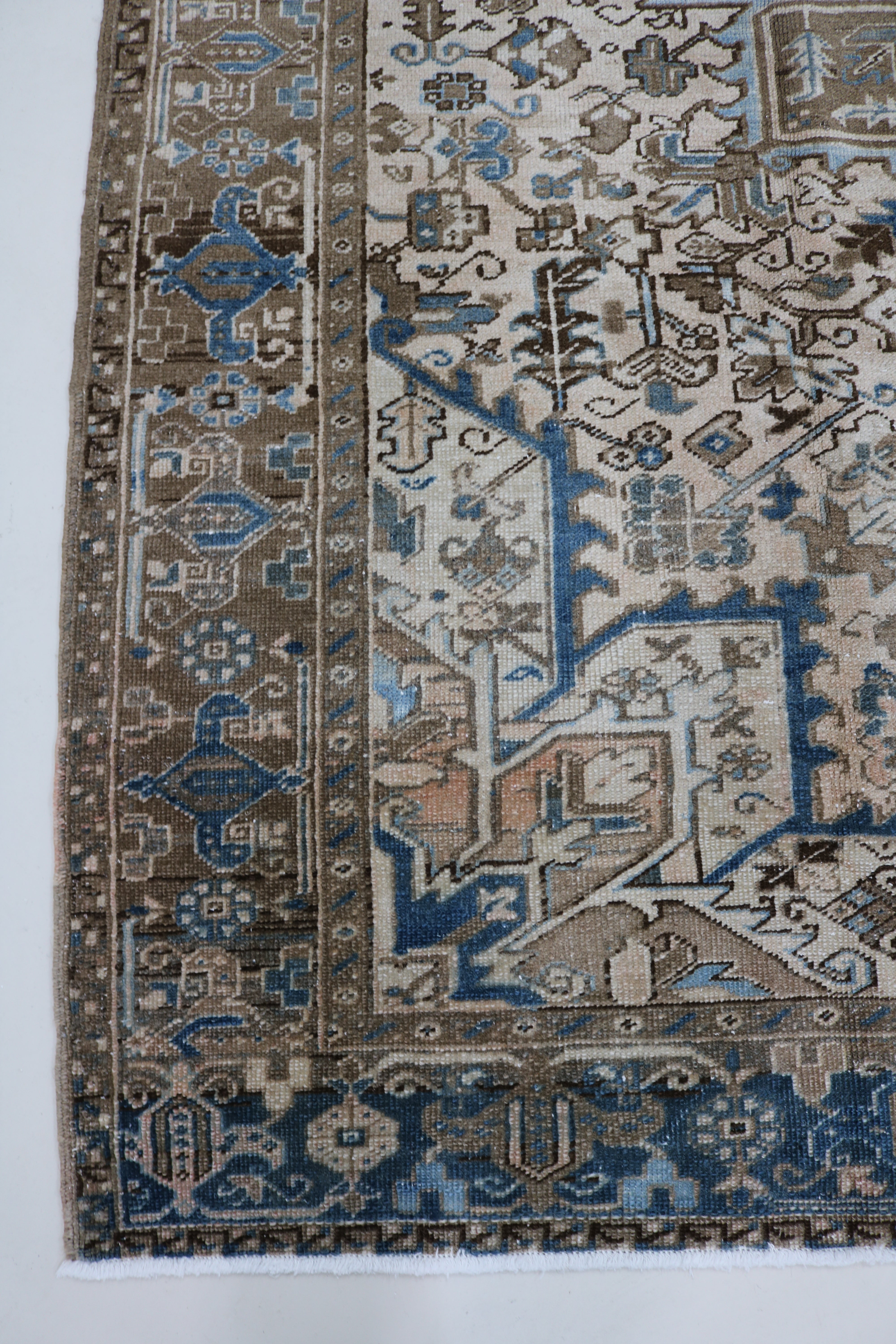 Long view of decorative antique Heriz carpet showing full length and proportions, 297 × 234 cm