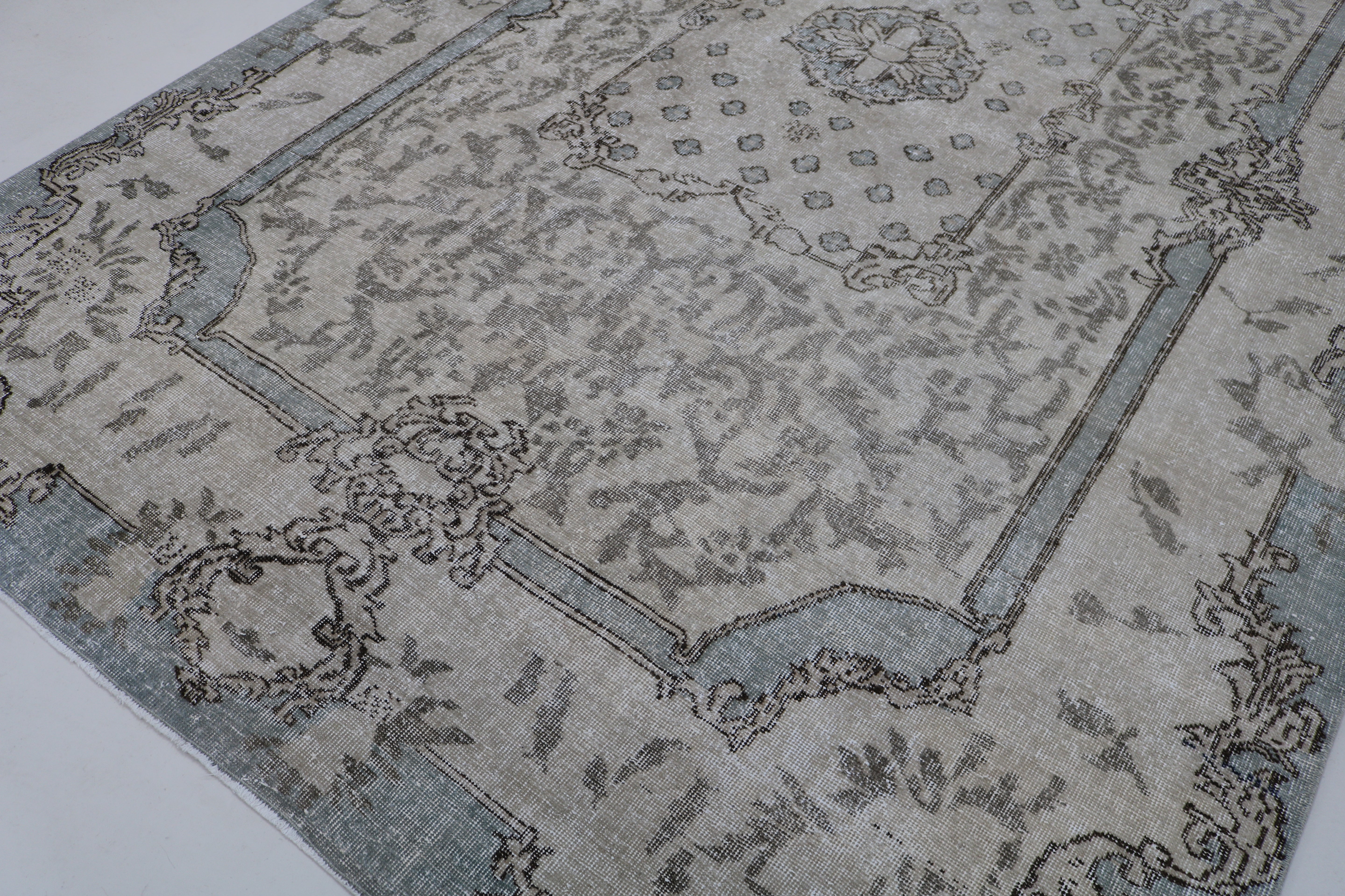 Close-up of hand-woven wool texture on vintage Turkish Sparta rug