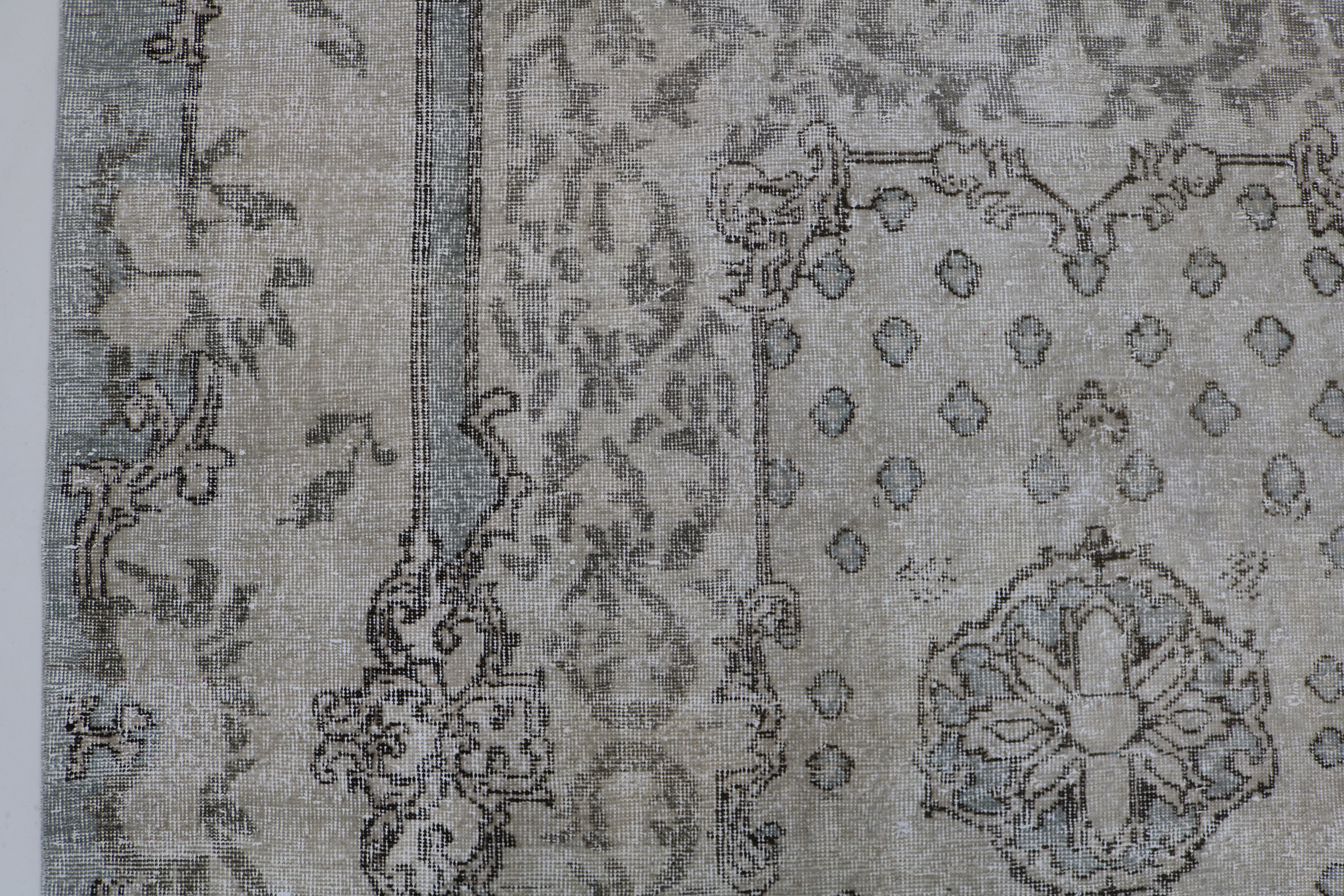 Close-up of hand-woven wool texture on vintage Turkish Sparta rug