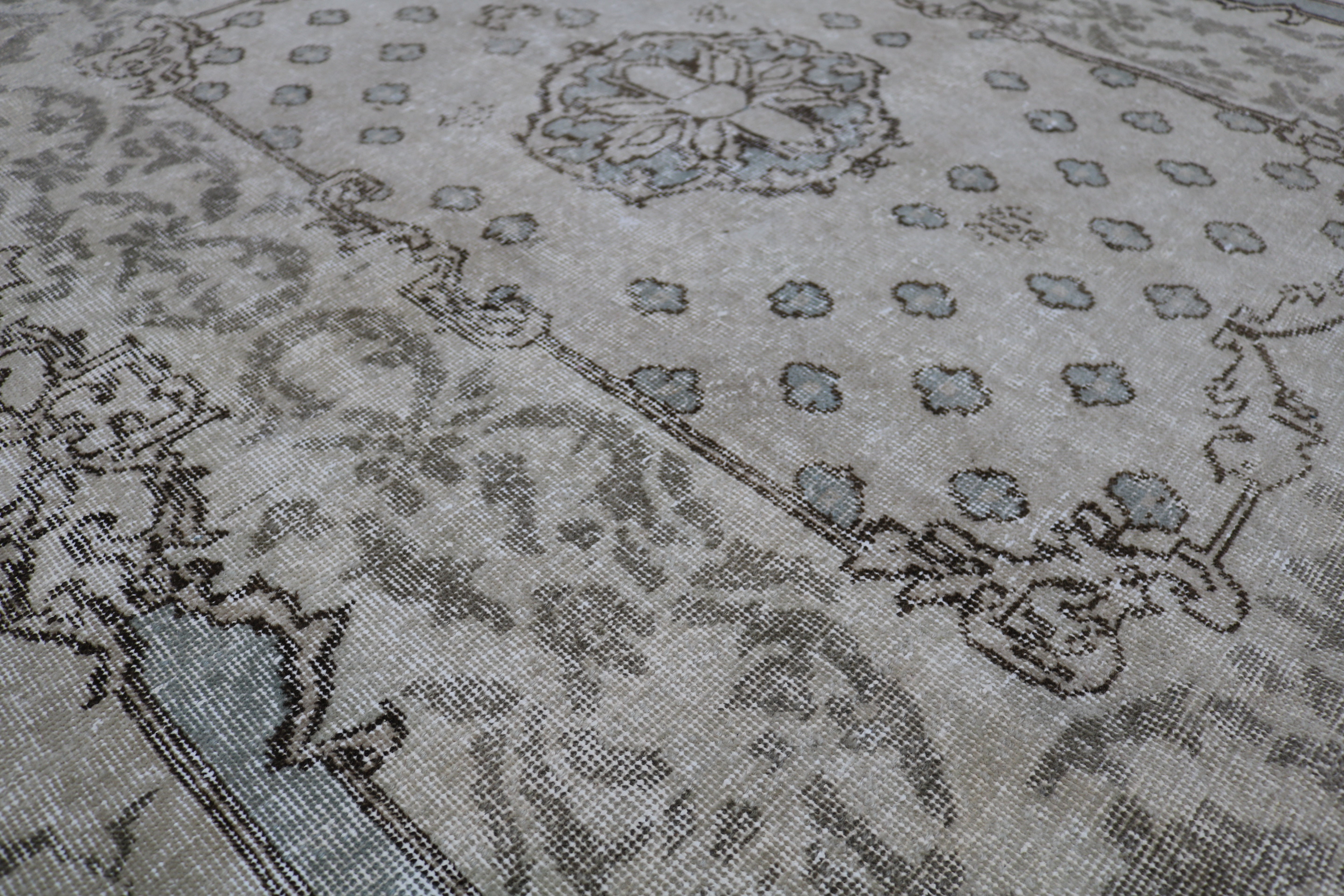 Close-up of hand-woven wool texture on vintage Turkish Sparta rug