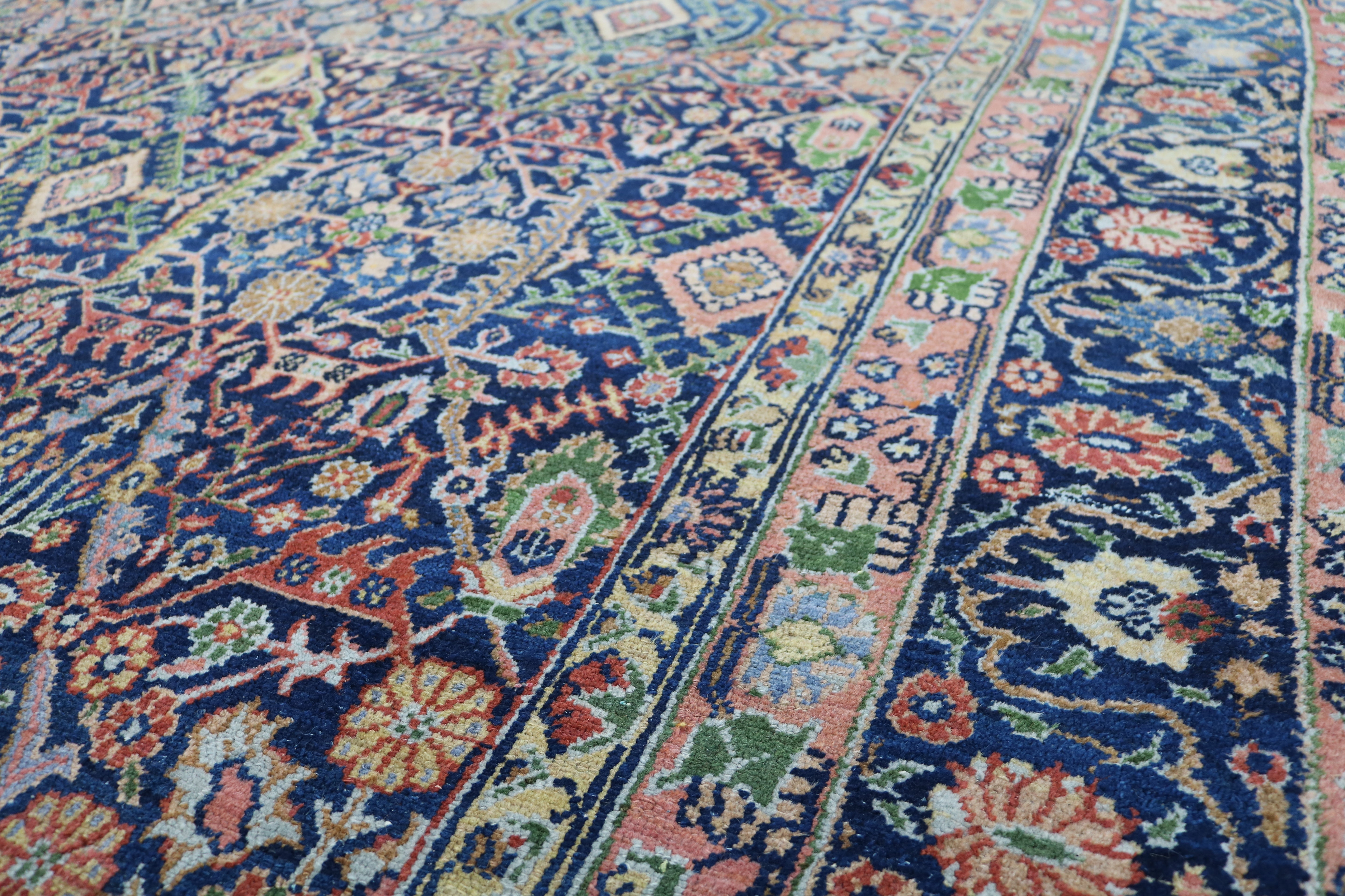 Close-up of finely woven wool texture on antique Persian Senneh carpet