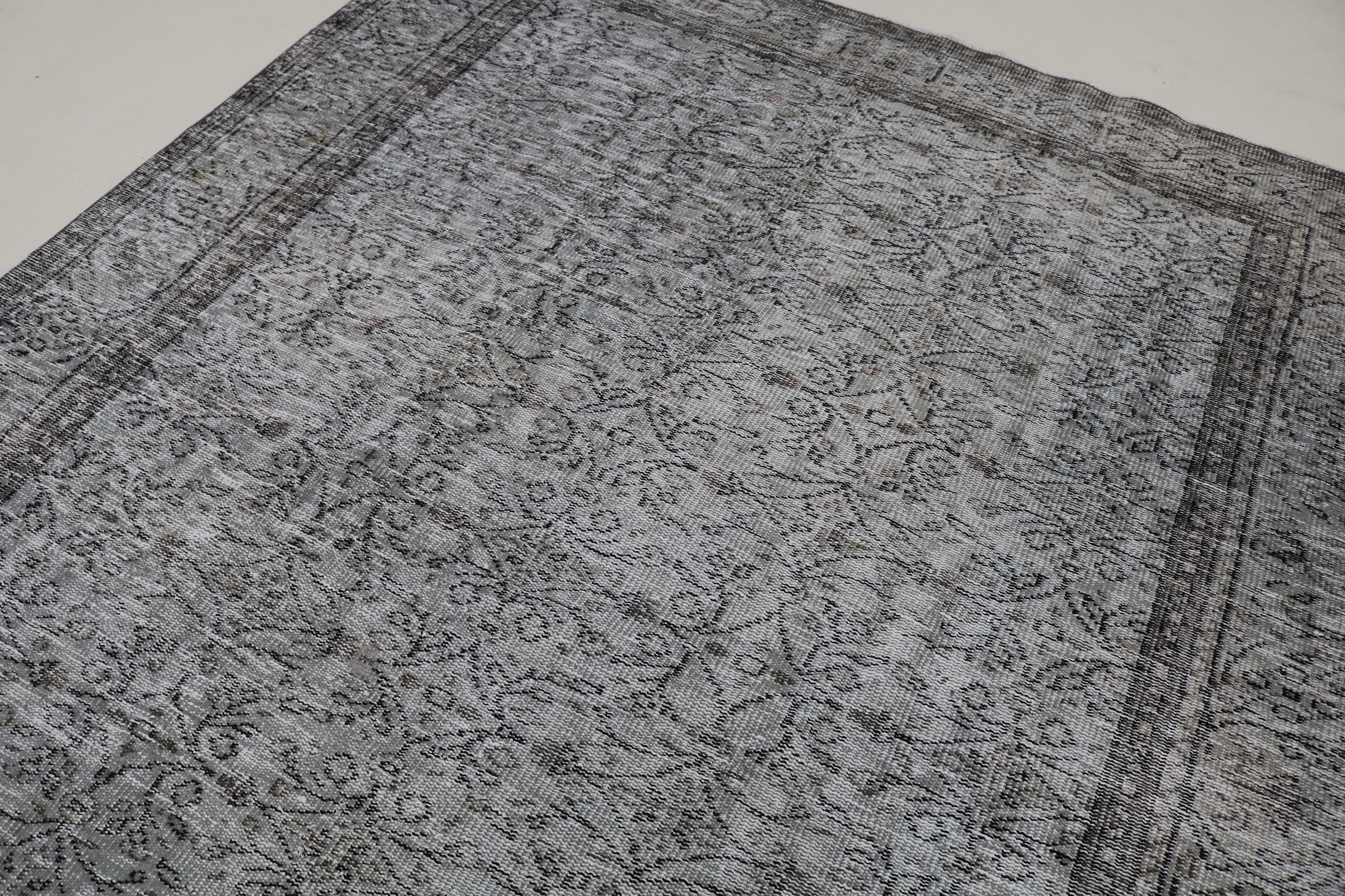 Close-up of hand-woven wool texture on vintage Turkish Sparta rug