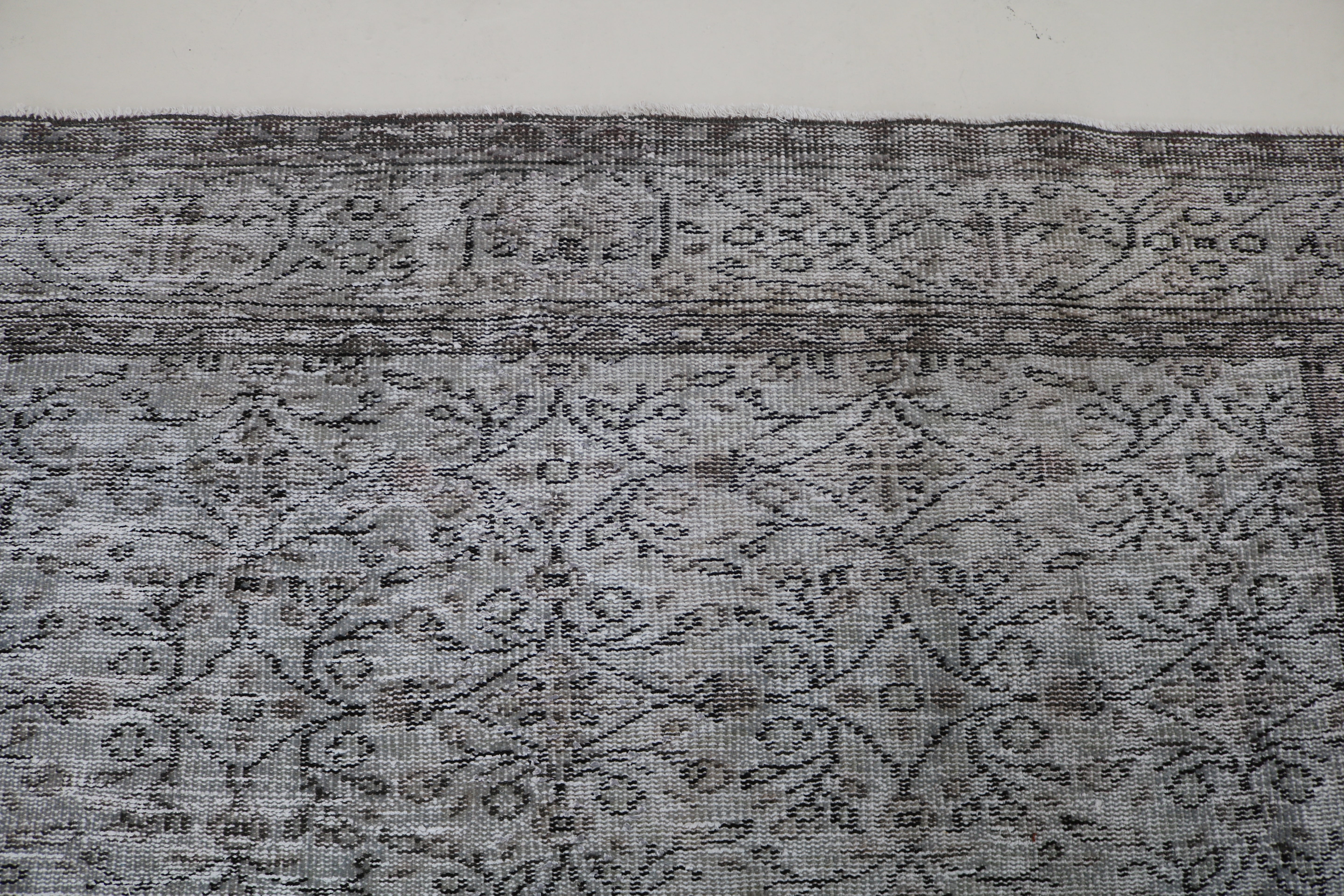 Close-up of hand-woven wool texture on vintage Turkish Sparta rug
