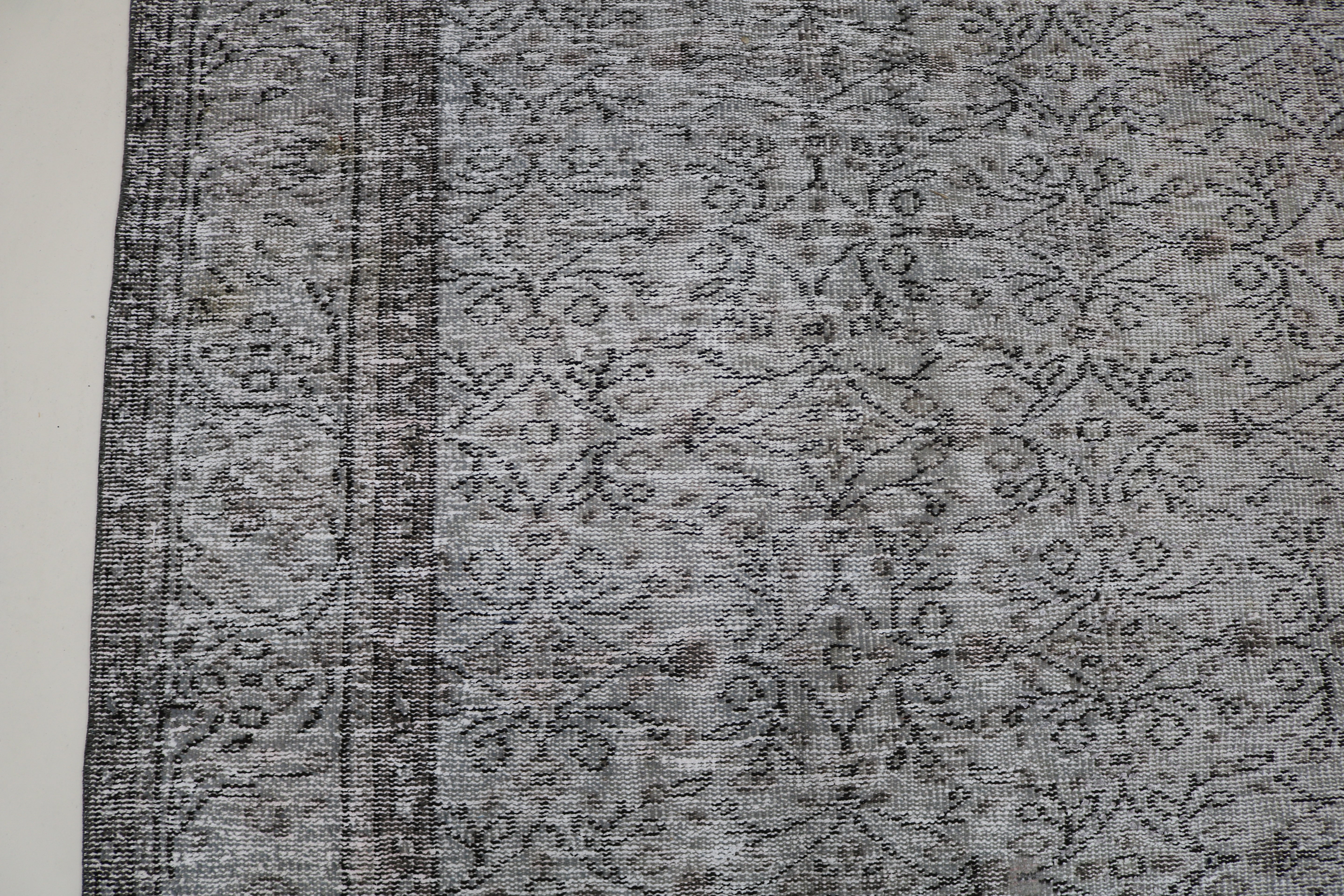 Close-up of hand-woven wool texture on vintage Turkish Sparta rug