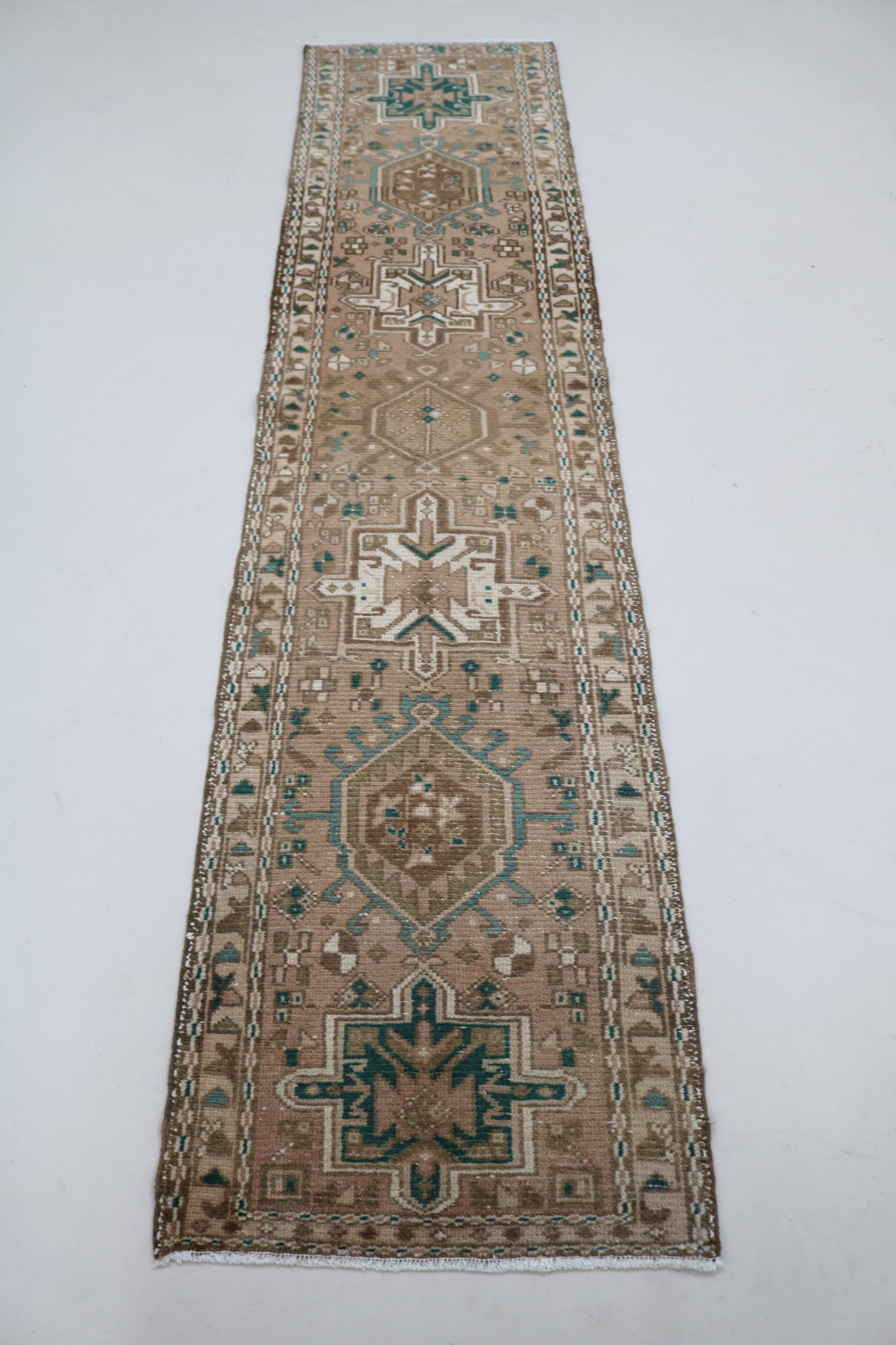 Full view of antique Persian Heriz runner with traditional geometric design