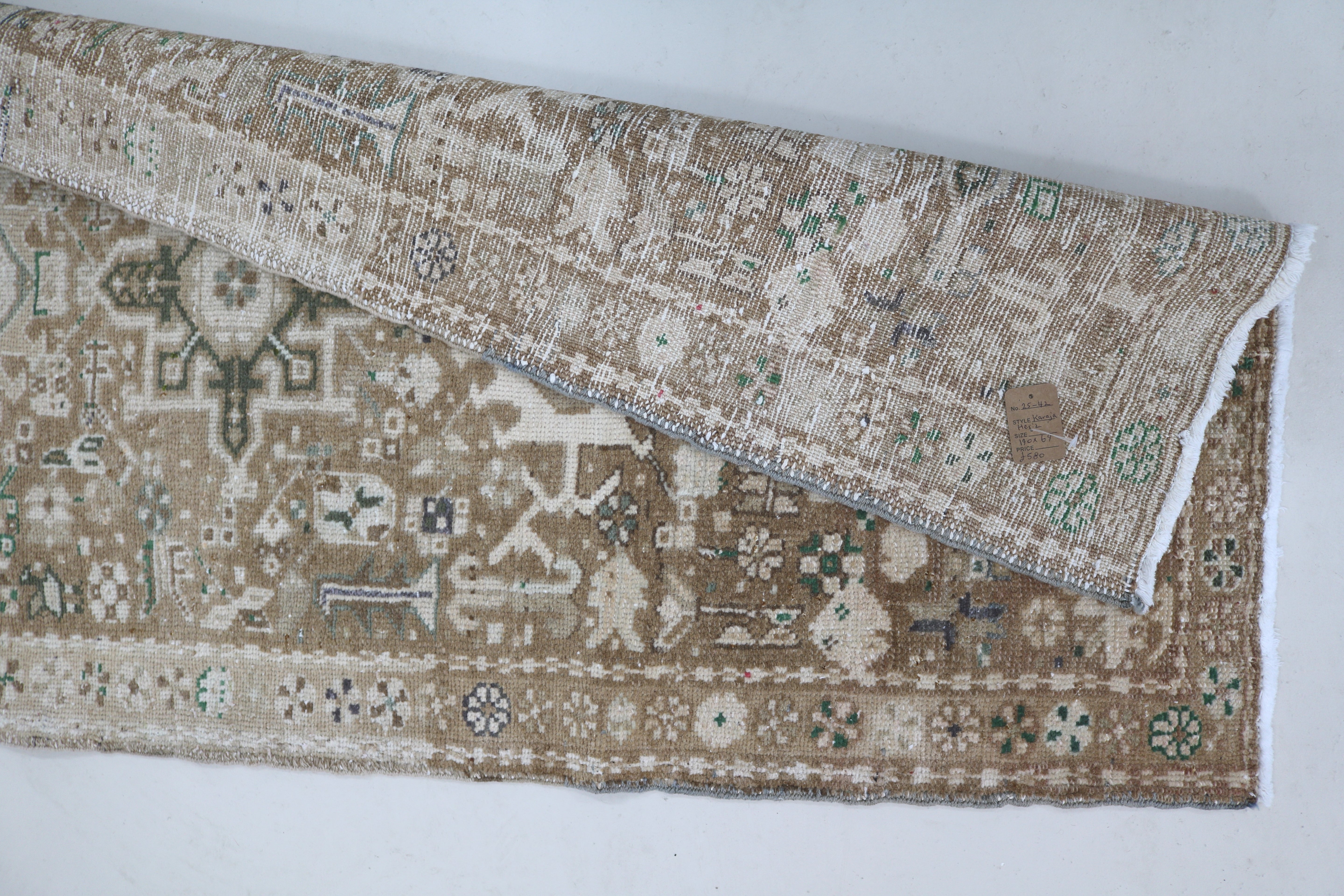 Close-up of hand-knotted backside on antique Persian Heriz runner