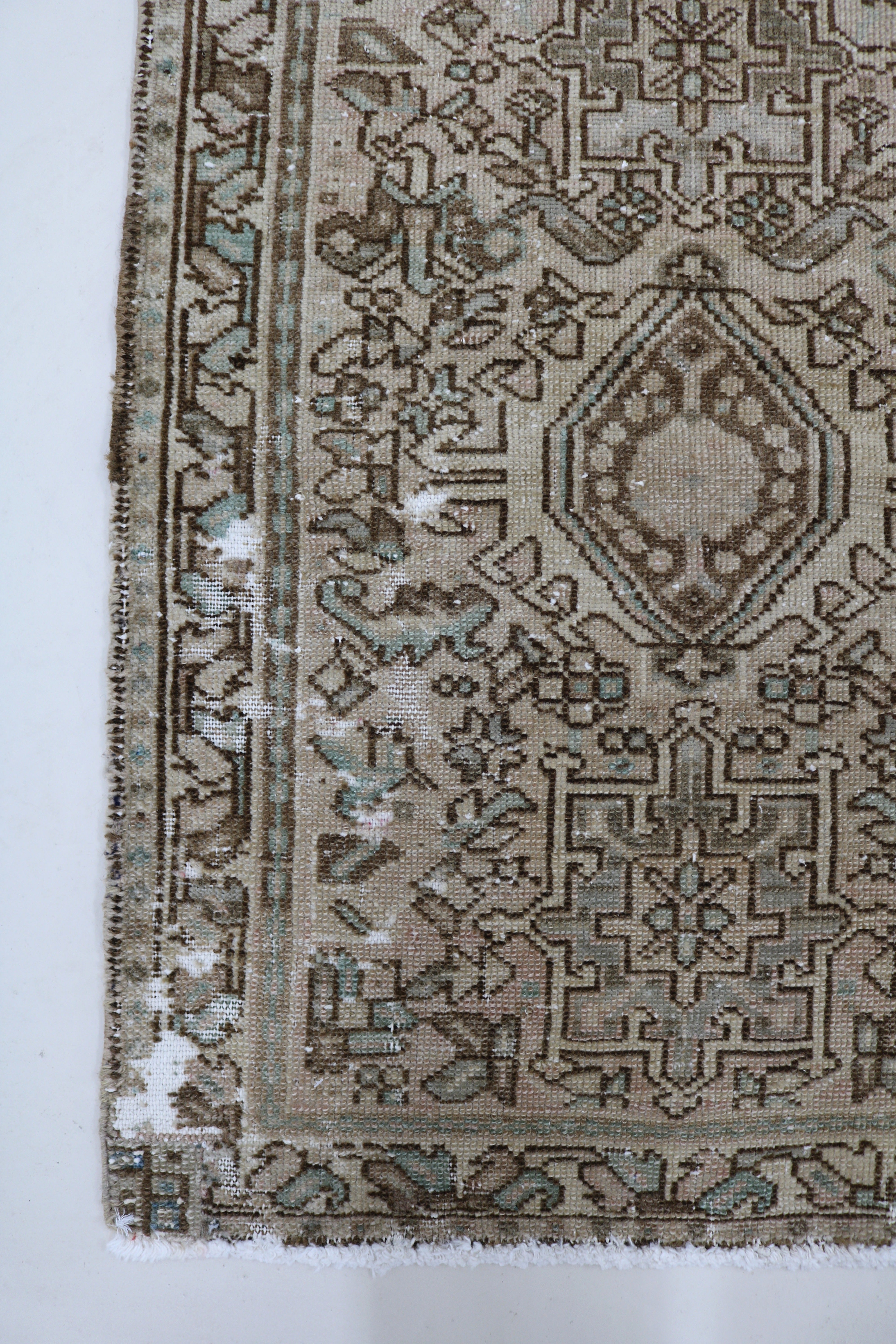 Antique Persian Heriz runner with compact geometric field, 183 × 60 cm