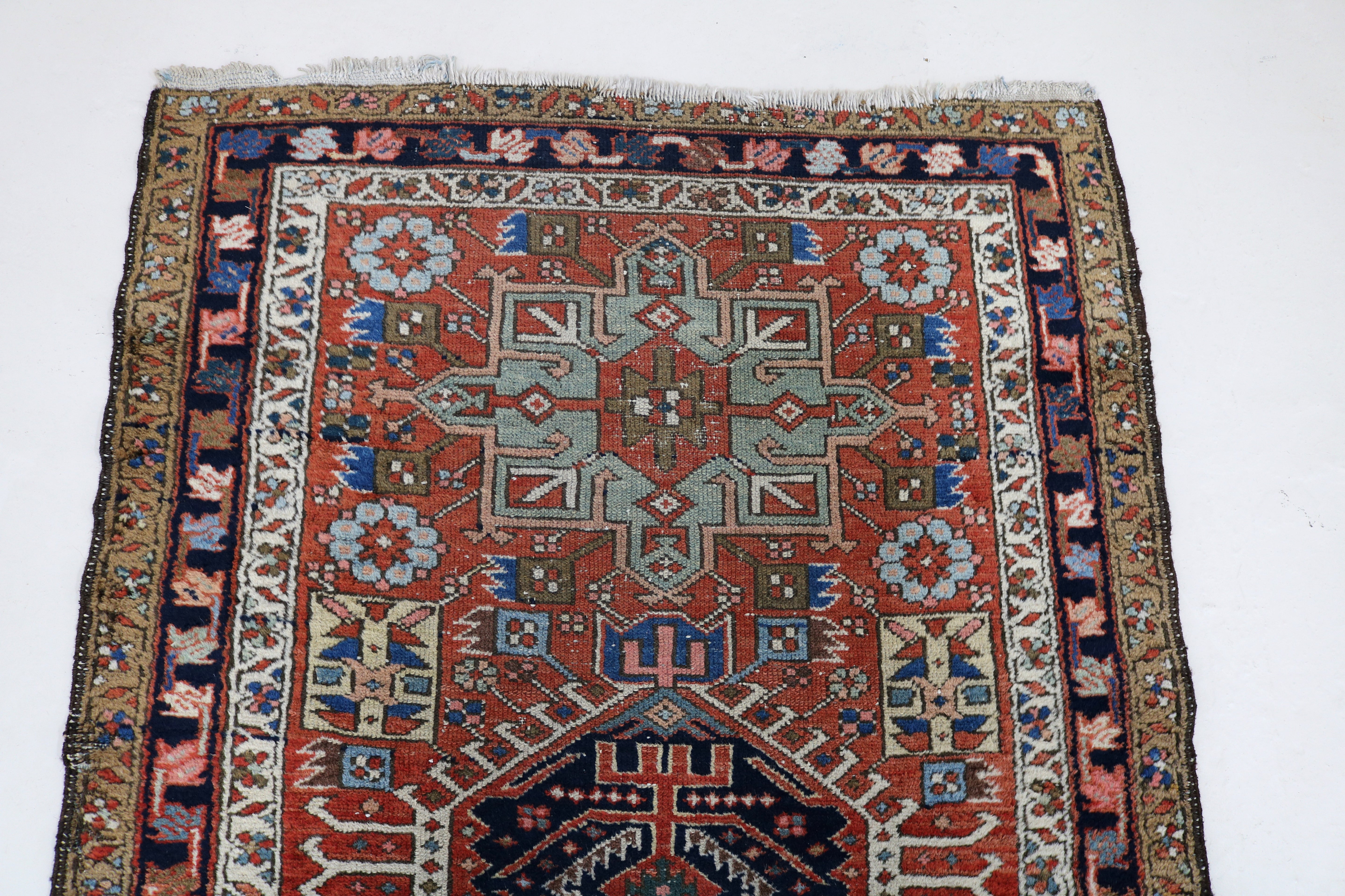 Close-up of stepped central medallion on antique Persian Karaja runner