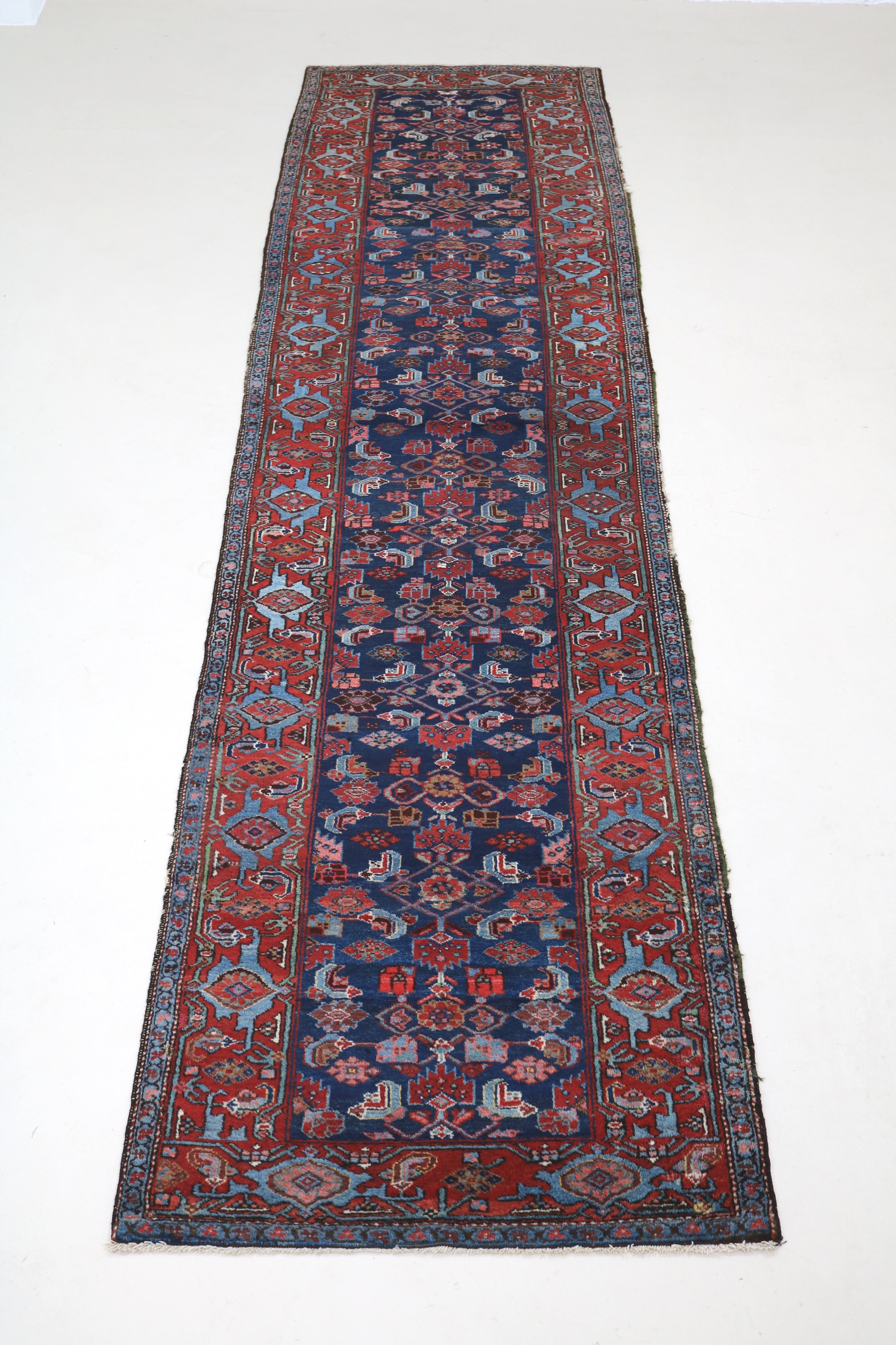 Full view of antique Persian Malayer runner with all-over Herati pattern