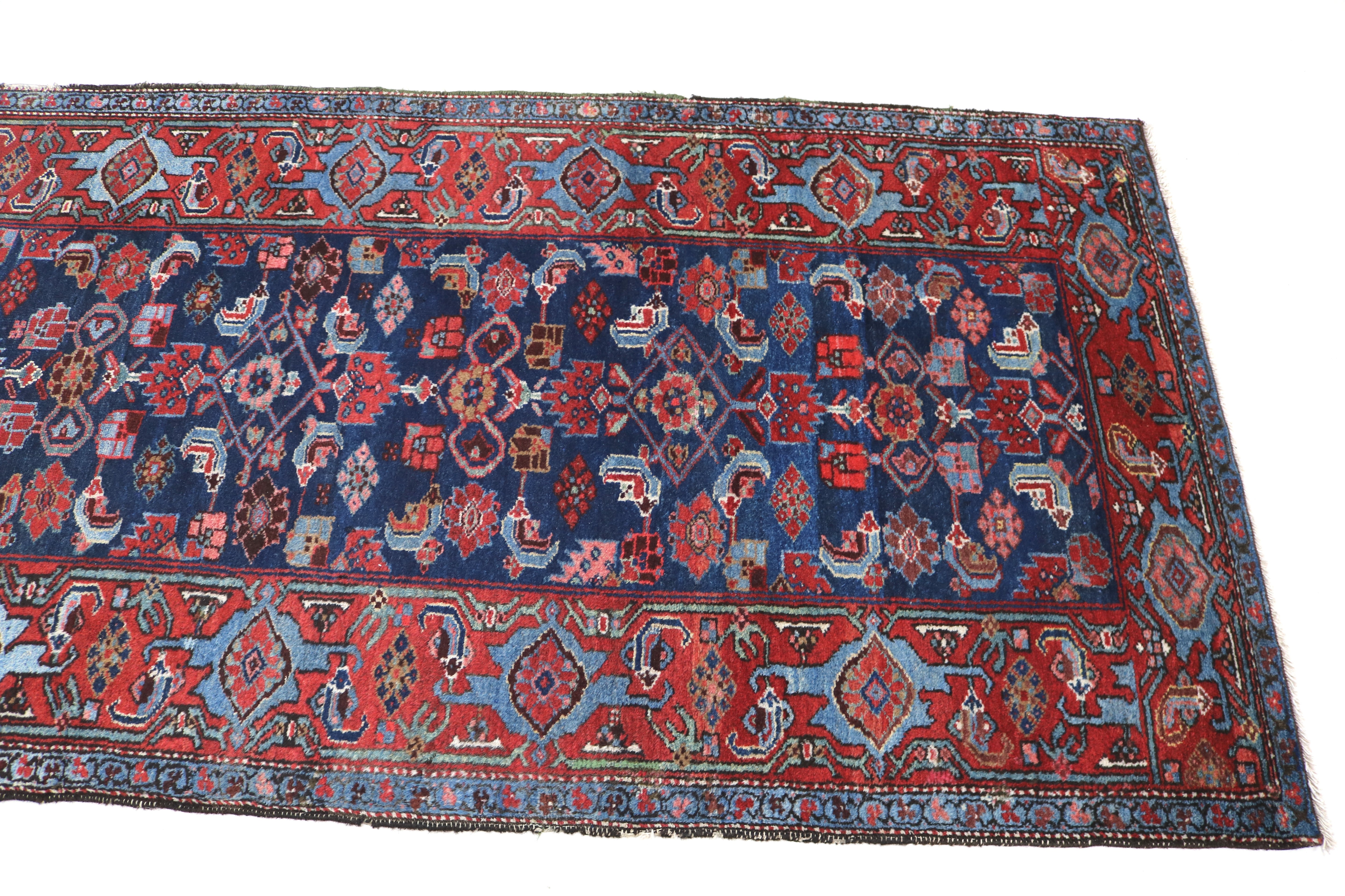 Close-up of end panel detail on antique Persian Malayer runner