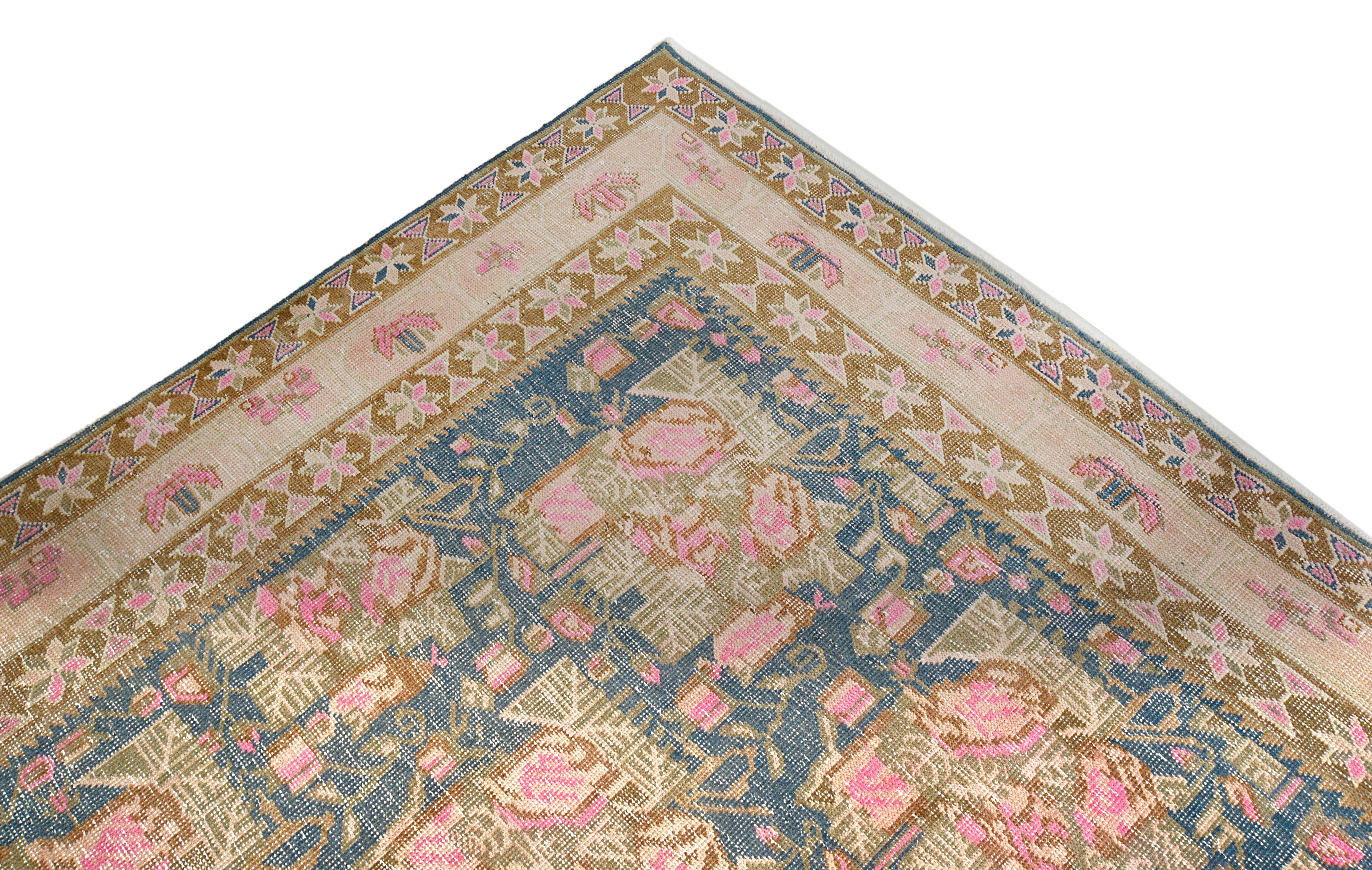 Close-up details of vintage Persian Afshar rug showing wool texture, borders, and natural patina