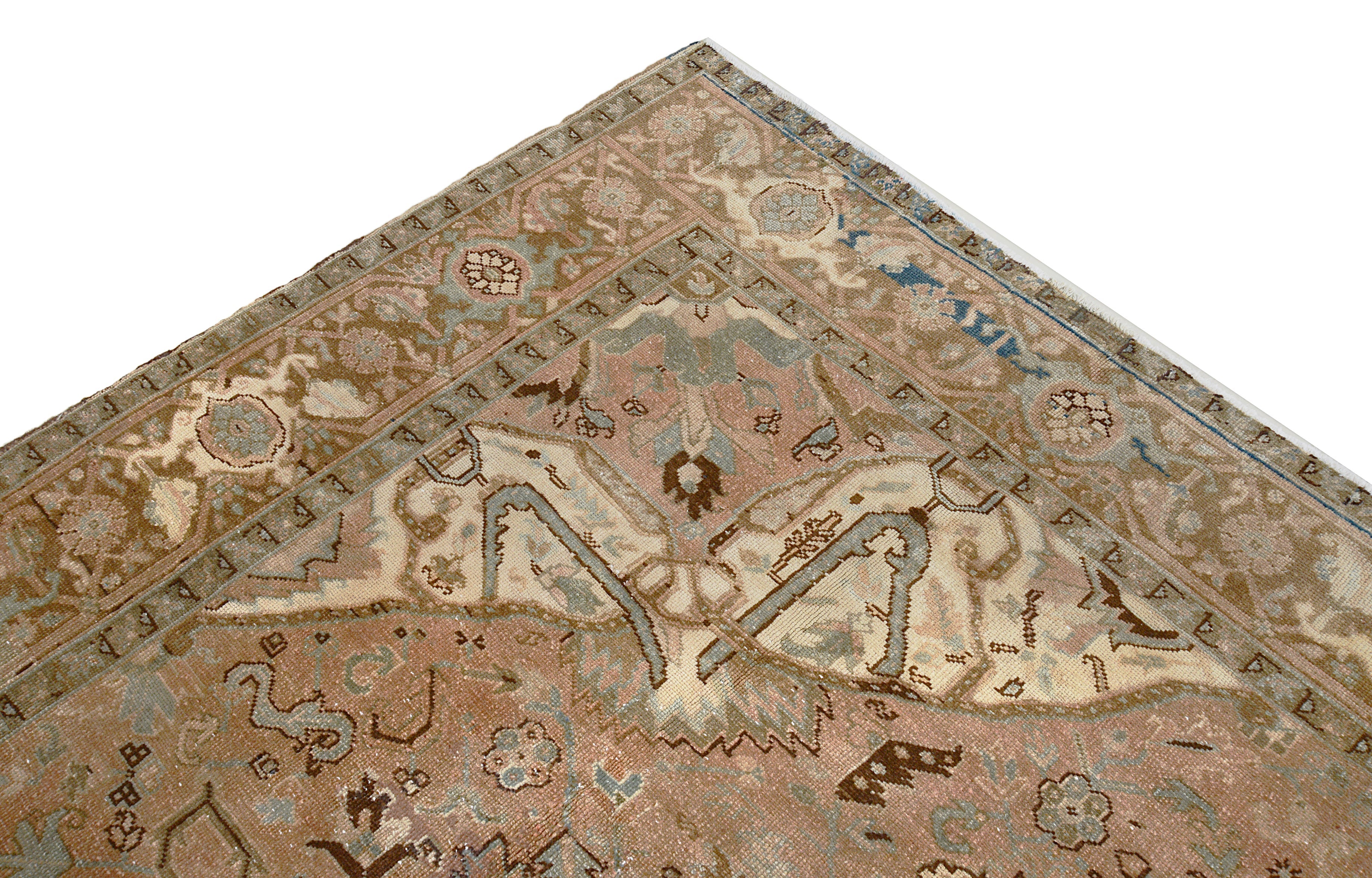 Close-up details of vintage Persian Heriz carpet showing wool texture, motifs, and natural patina