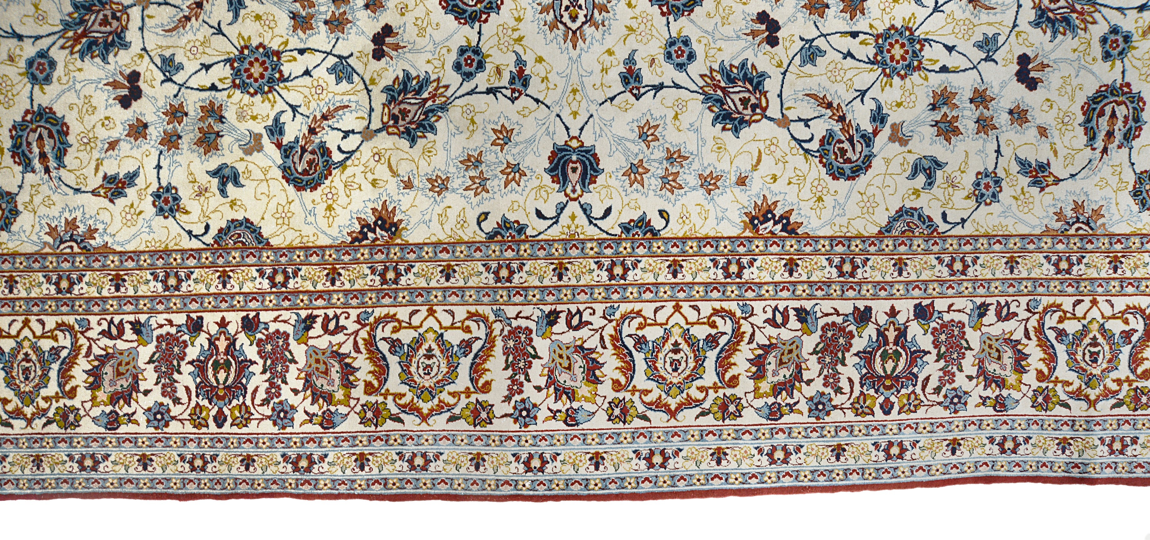 Close-up details of fine antique Persian Kashan rug showing silk warp fringes, wool texture, and aged patina