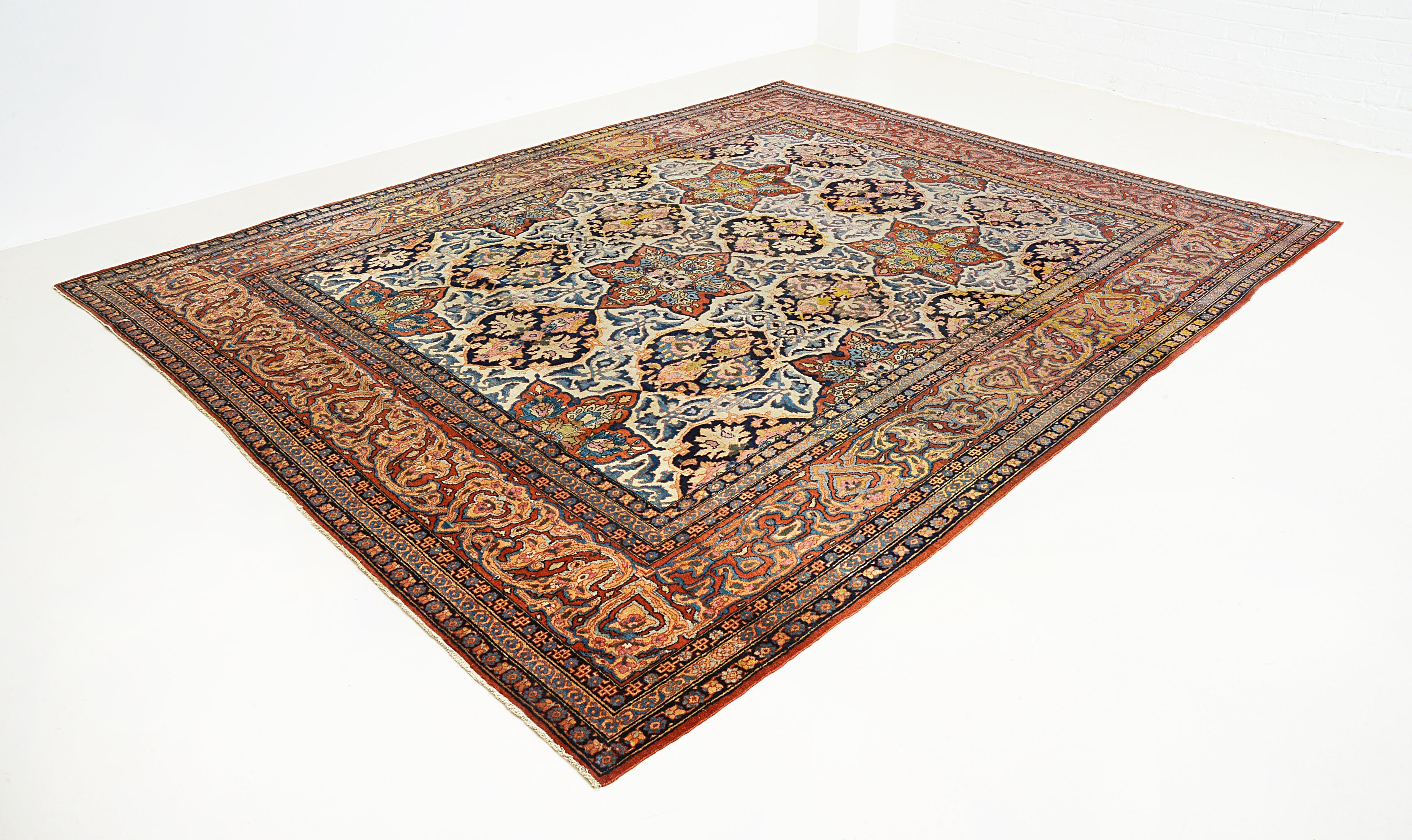 Large fine Isfahan carpet from Persia featuring refined pattern and balanced composition