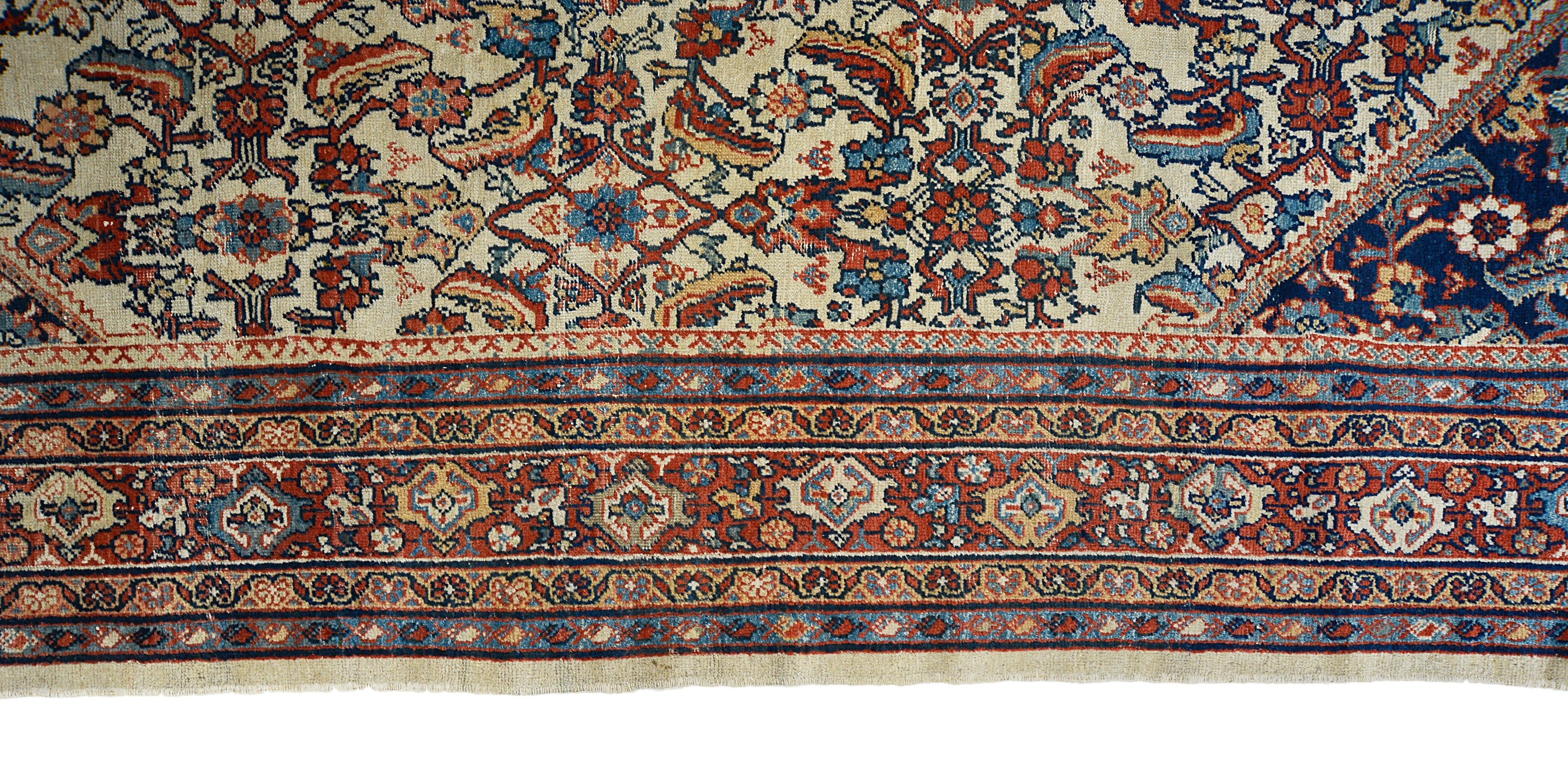 Detailed view of antique Persian Mahal rug showing wool texture and age-related character