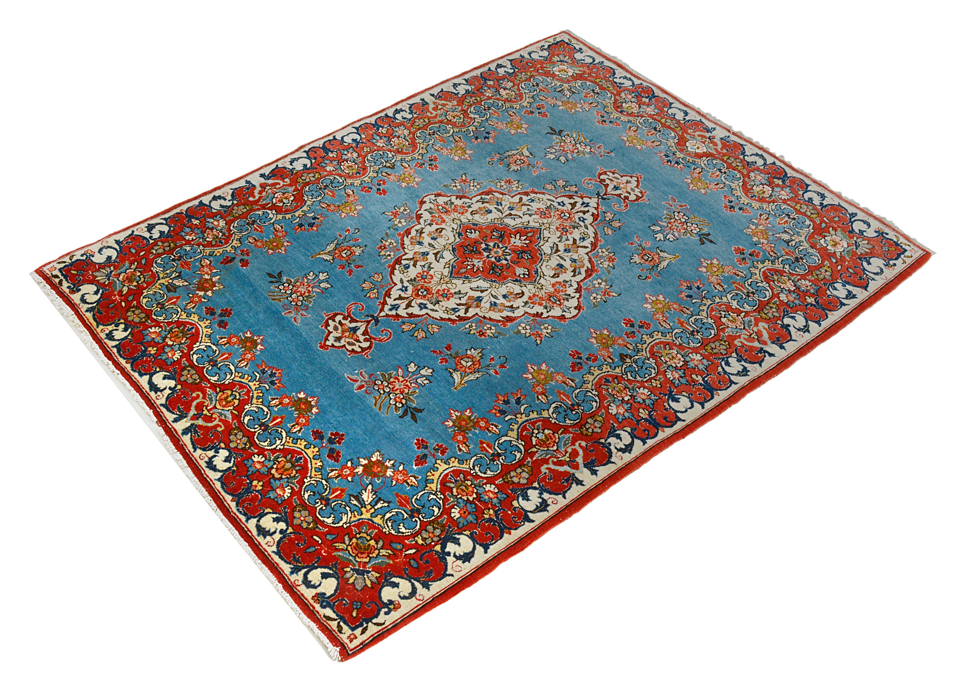 Small antique Persian Qom rug featuring refined floral design and rich colours