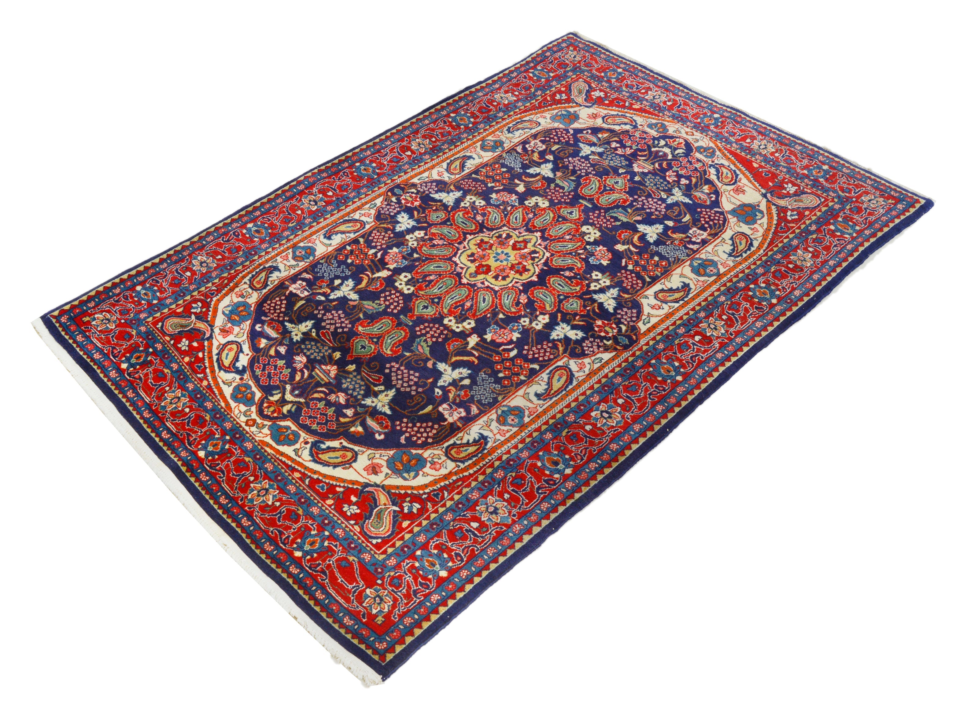 Small vintage Persian Sarouk rug featuring classic floral design and red border