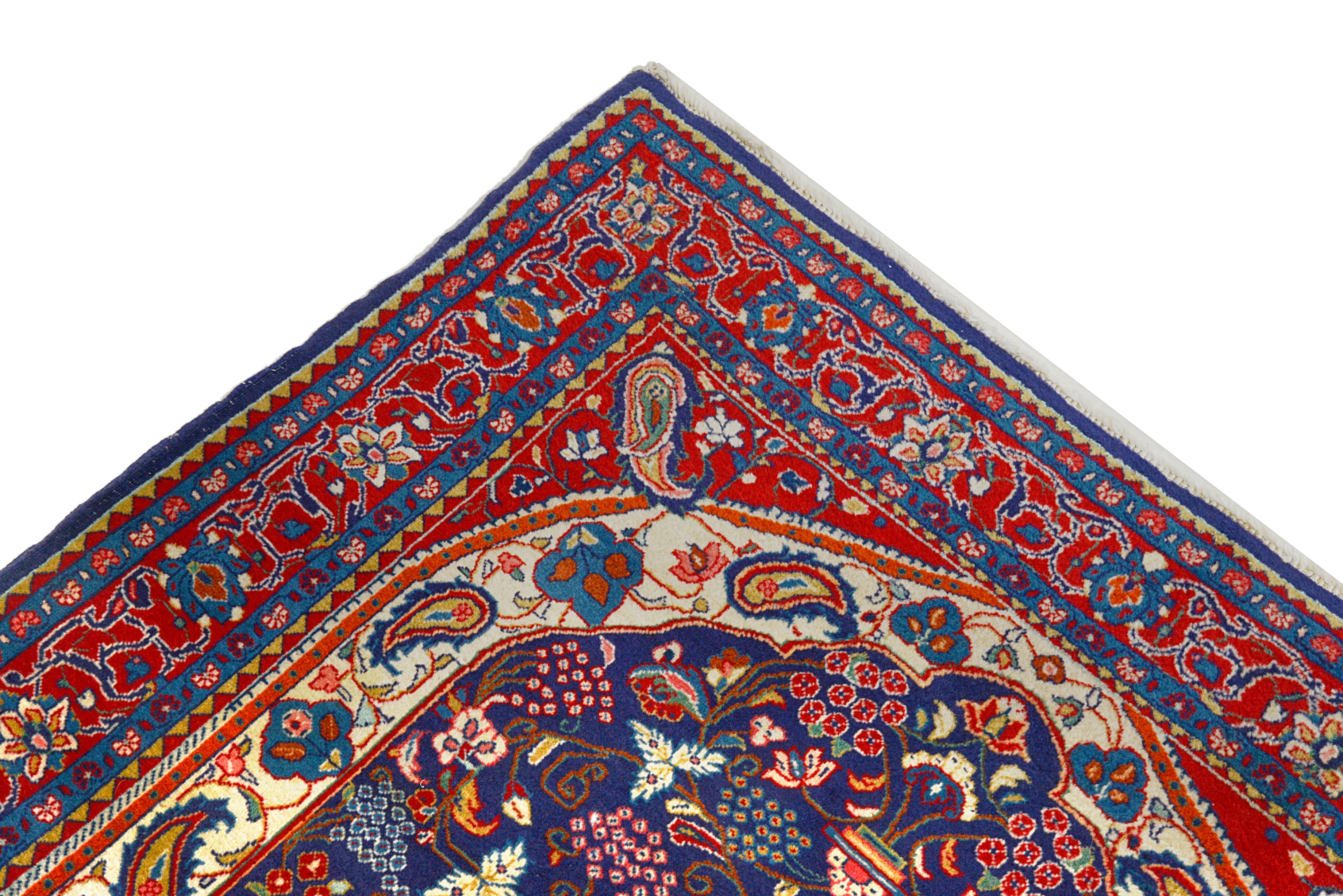 Close-up details of vintage Persian Sarouk rug showing wool texture, motifs, and natural patina