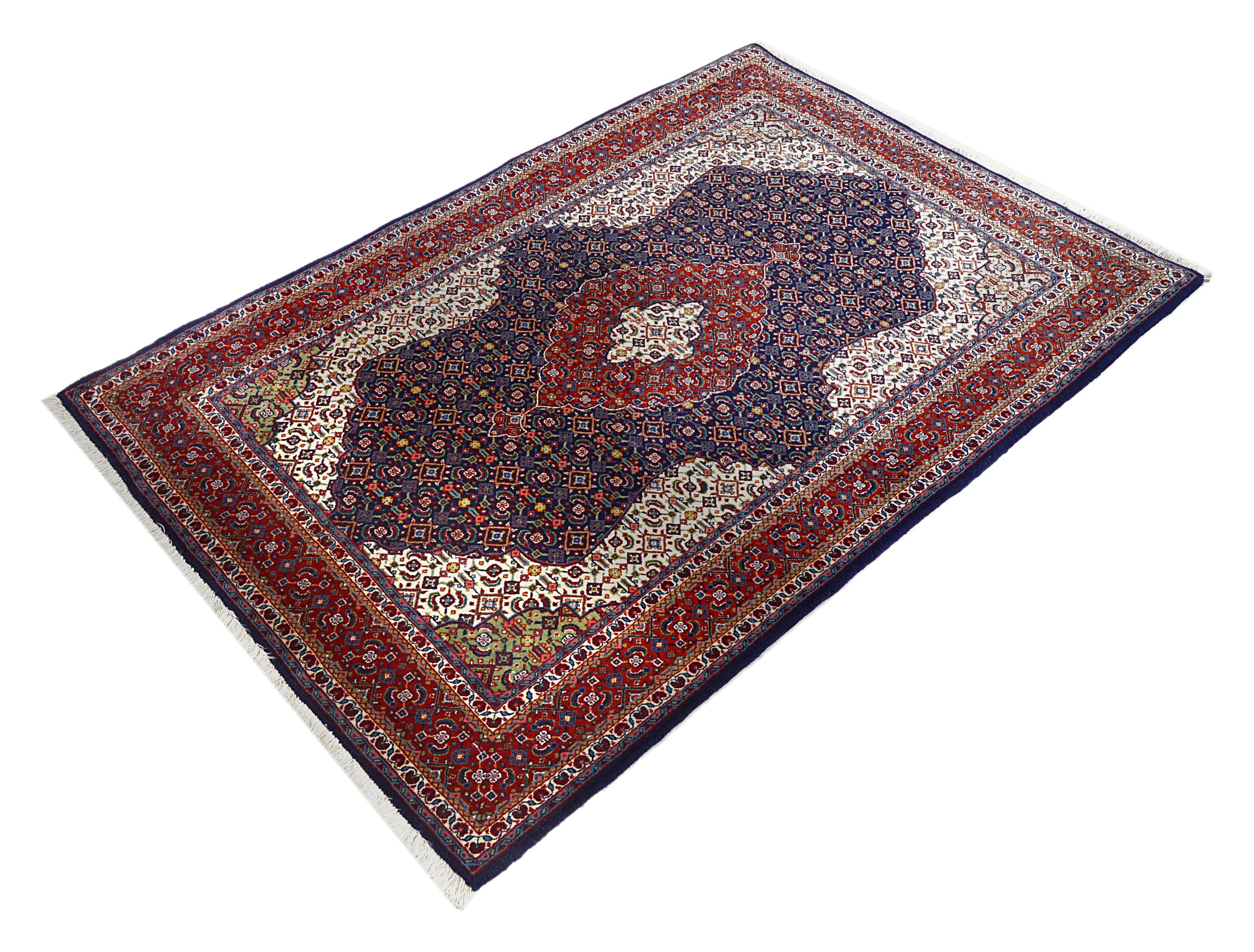 Medium-size vintage Persian Sarouk rug featuring classic design and red border