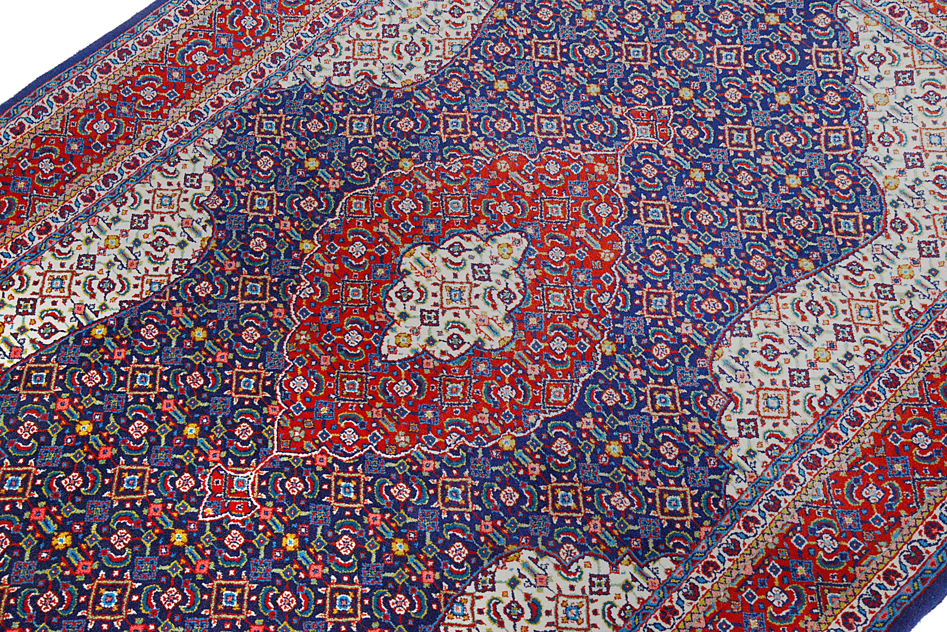 Close-up details of vintage Persian Sarouk rug showing wool texture, motifs, and natural patina