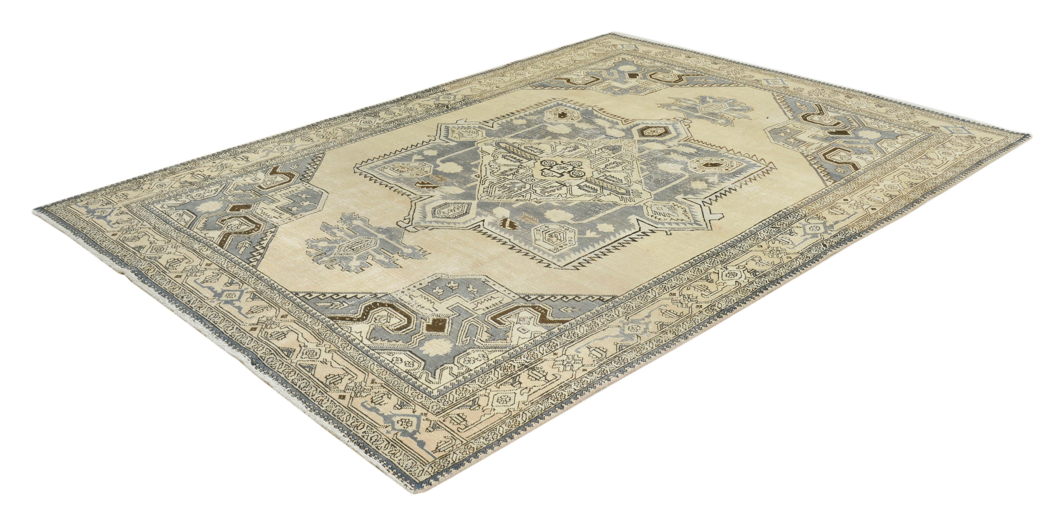 Medium-size vintage Tabriz carpet from Persia featuring balanced composition and soft aged tones