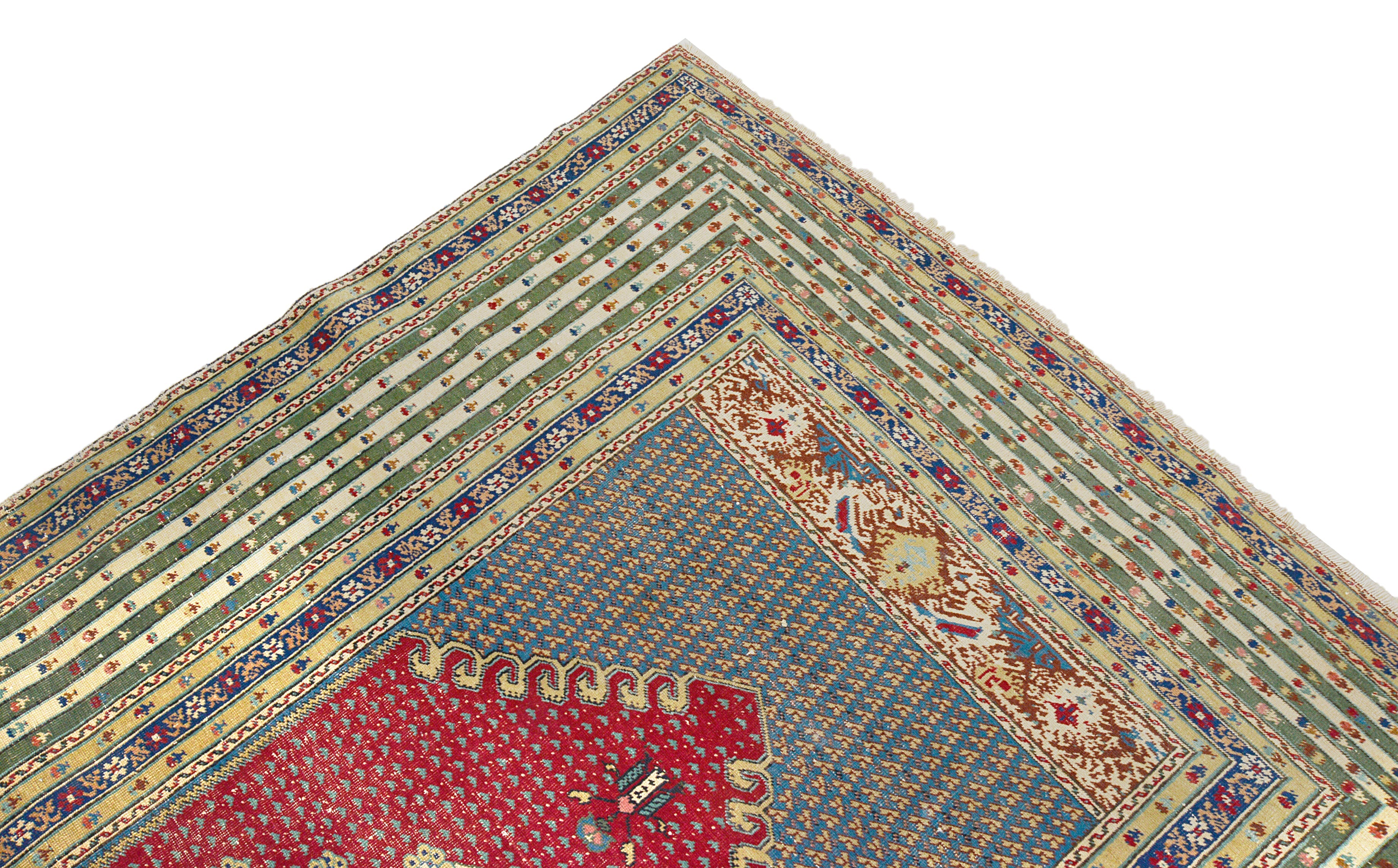 Close-up details of antique Turkish rug showing wool texture, motifs, and natural patina
