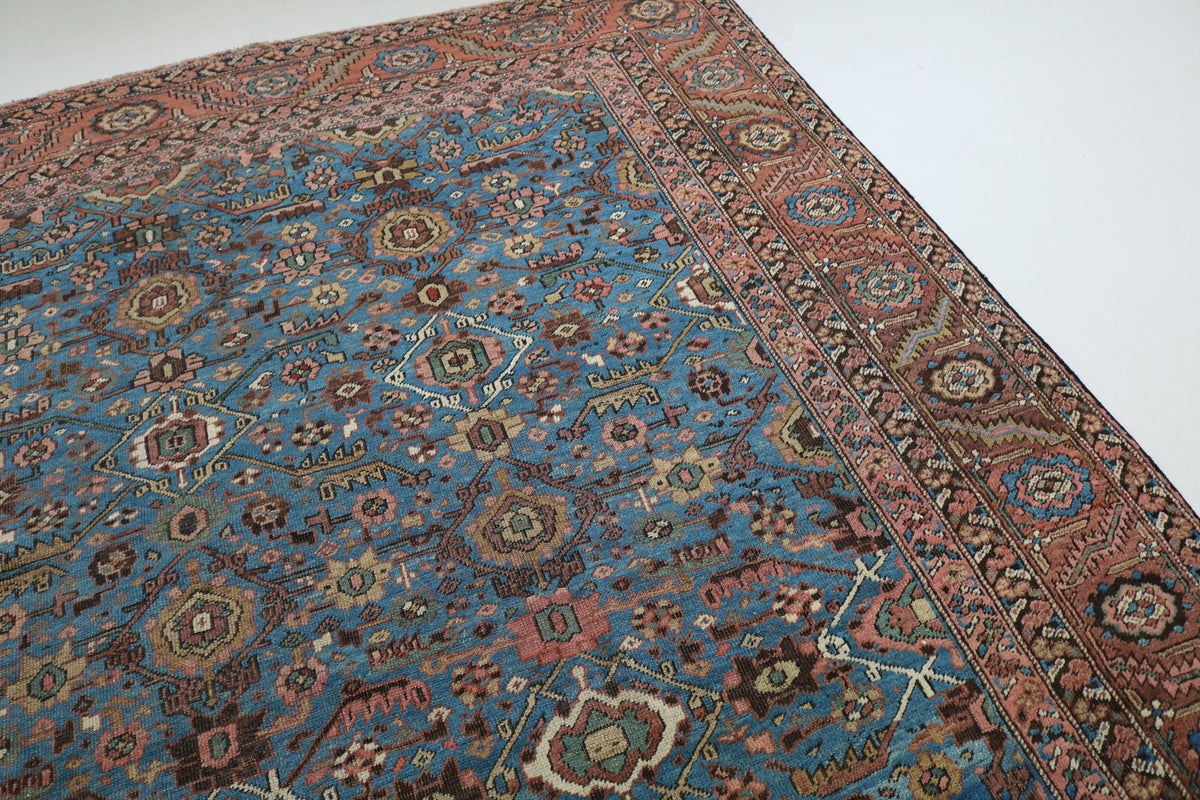 Angled view of Bakshayesh carpet highlighting the overall floral composition