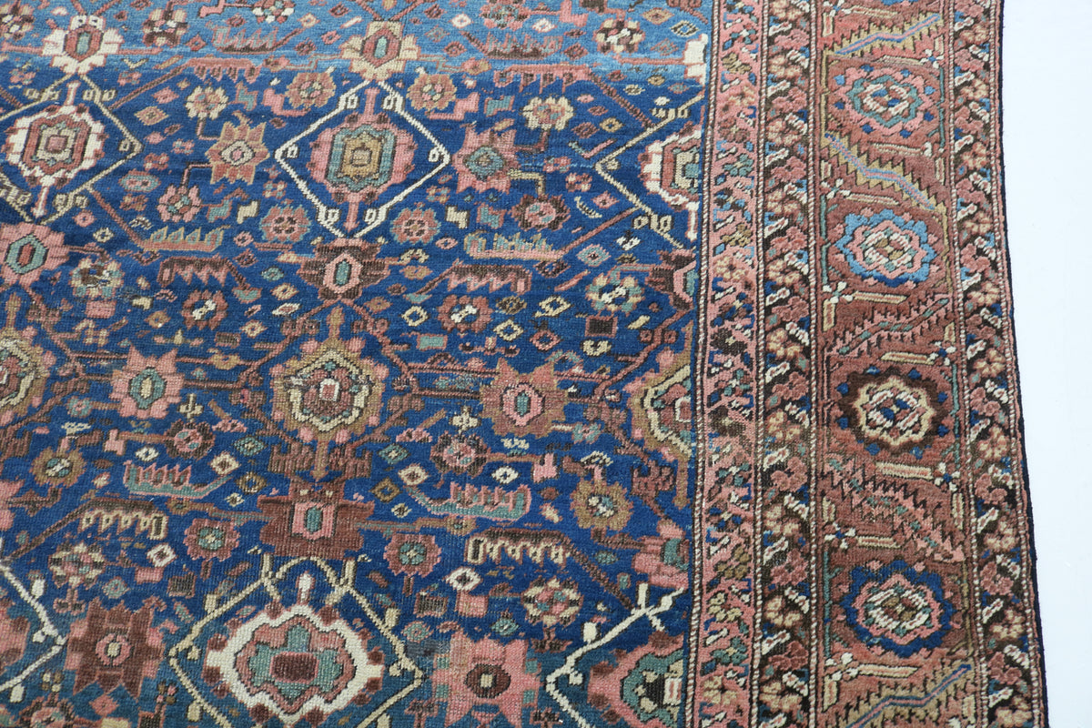 Detailed Bakshayesh carpet field with dense floral and geometric motifs