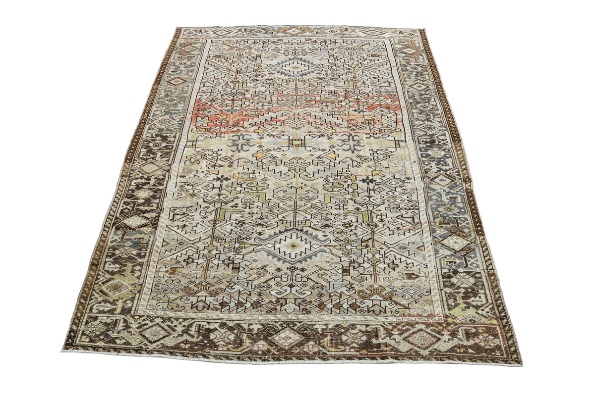 Full view of antique Persian Heriz carpet with traditional geometric design