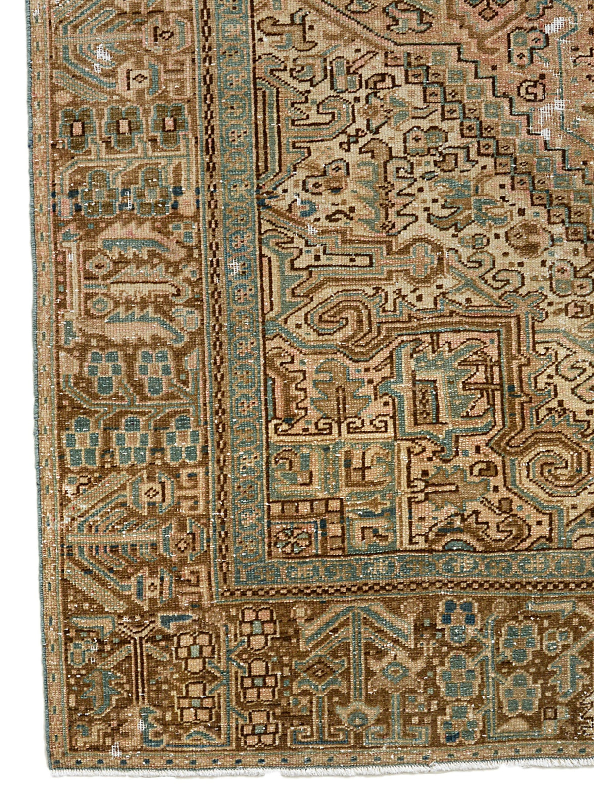 Antique Persian Heriz carpet with muted terracotta field, geometric motifs, blue and ivory accents