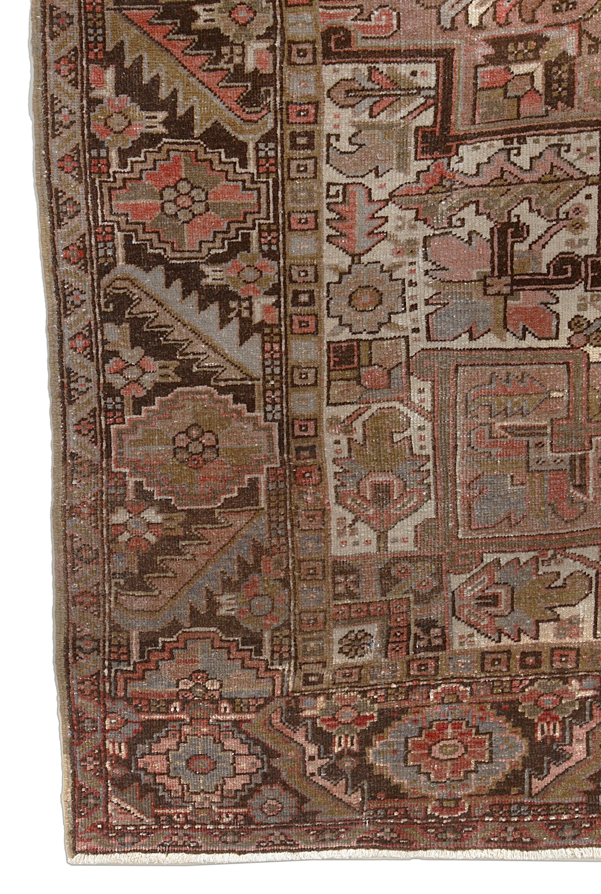Antique Persian Heriz carpet with geometric motifs, warm brick red tones and detailed border