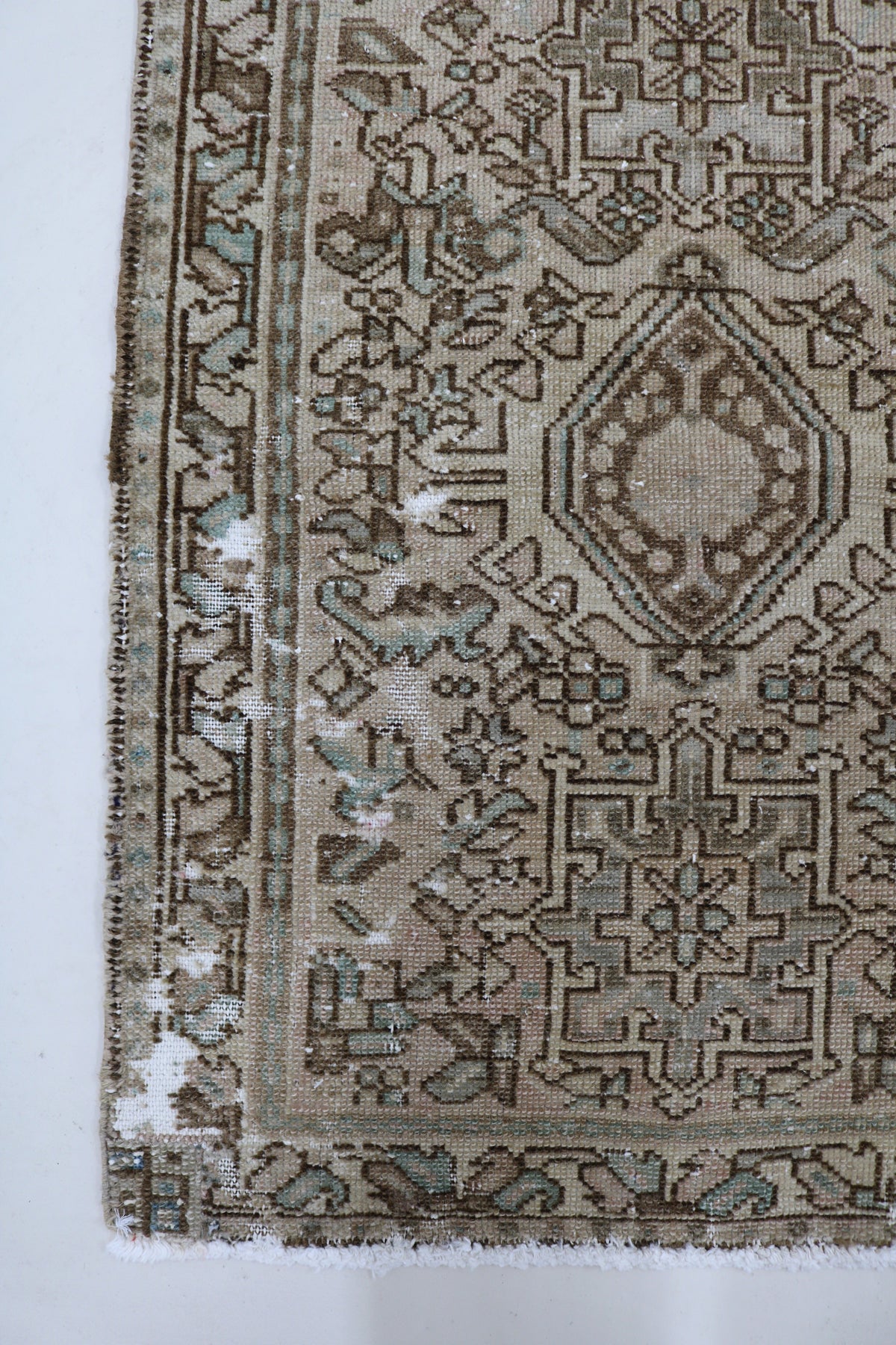 Antique Persian Heriz runner with beige field and intricate geometric motifs