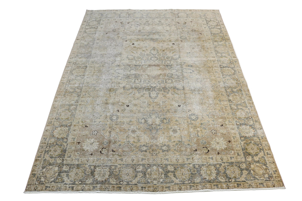 Full view of antique Persian Tabriz carpet with refined floral design