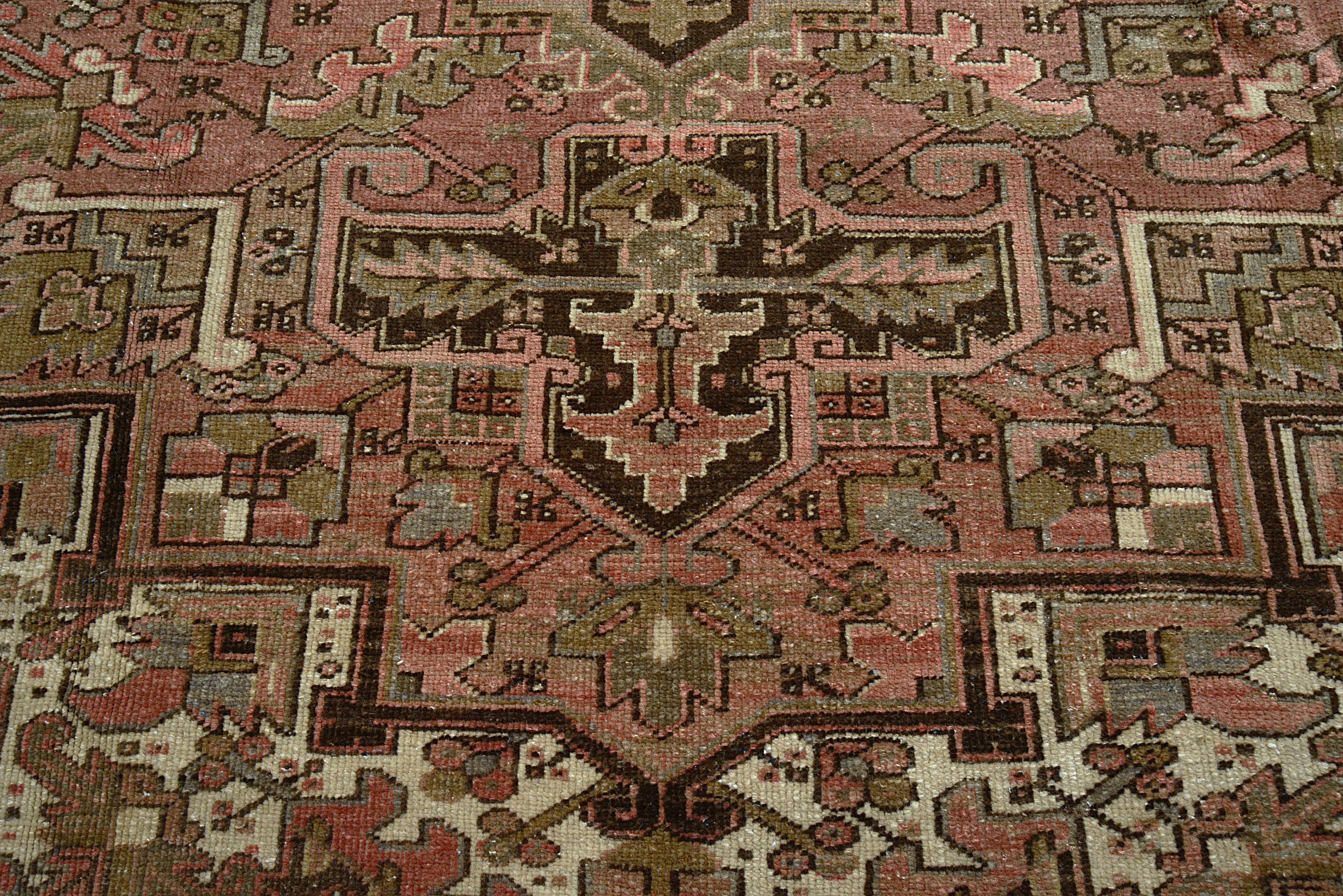 Close-up of central design area on antique Persian Heriz carpet