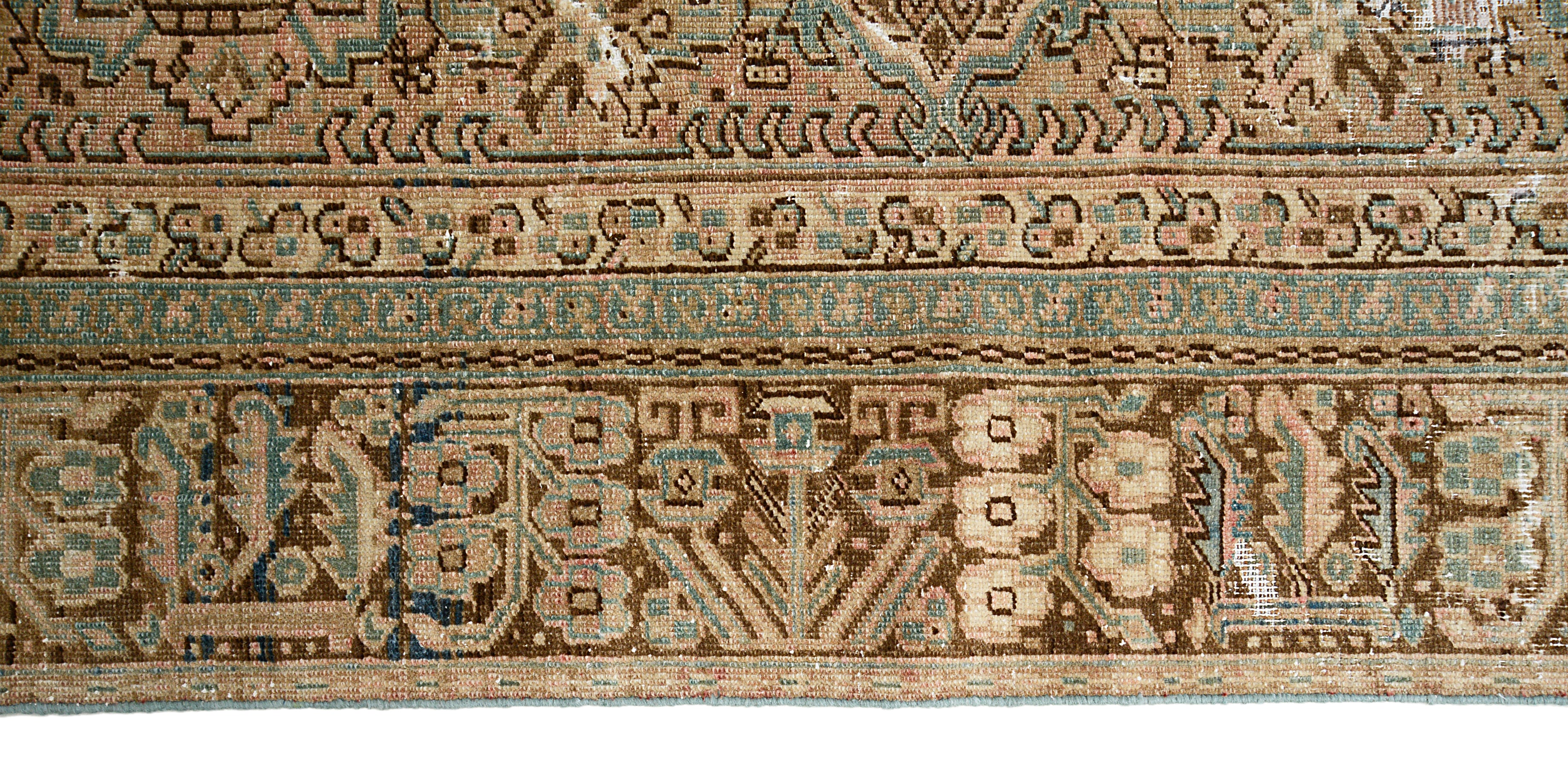 Close-up of border pattern on antique Persian Heriz carpet