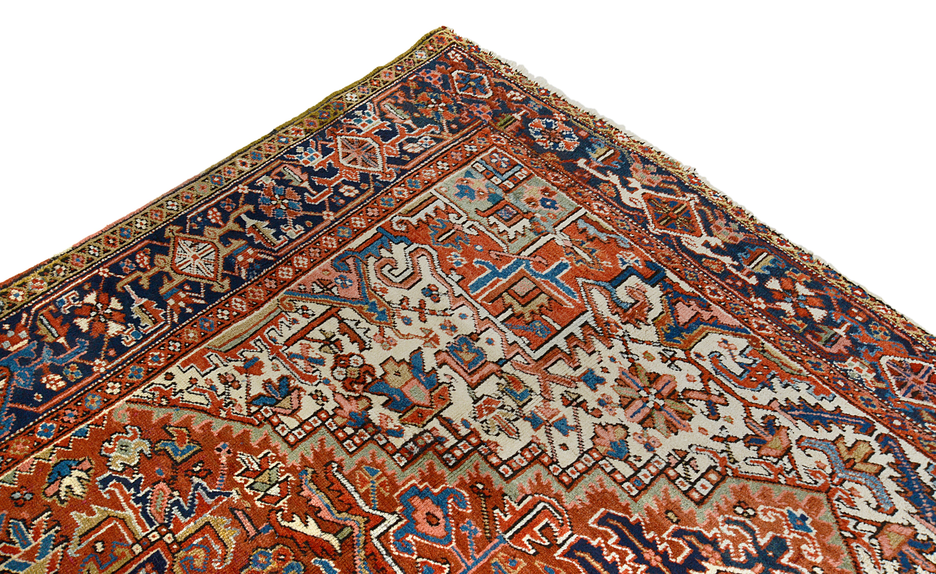 Close-up of a corner motif on an antique Persian Heriz carpet