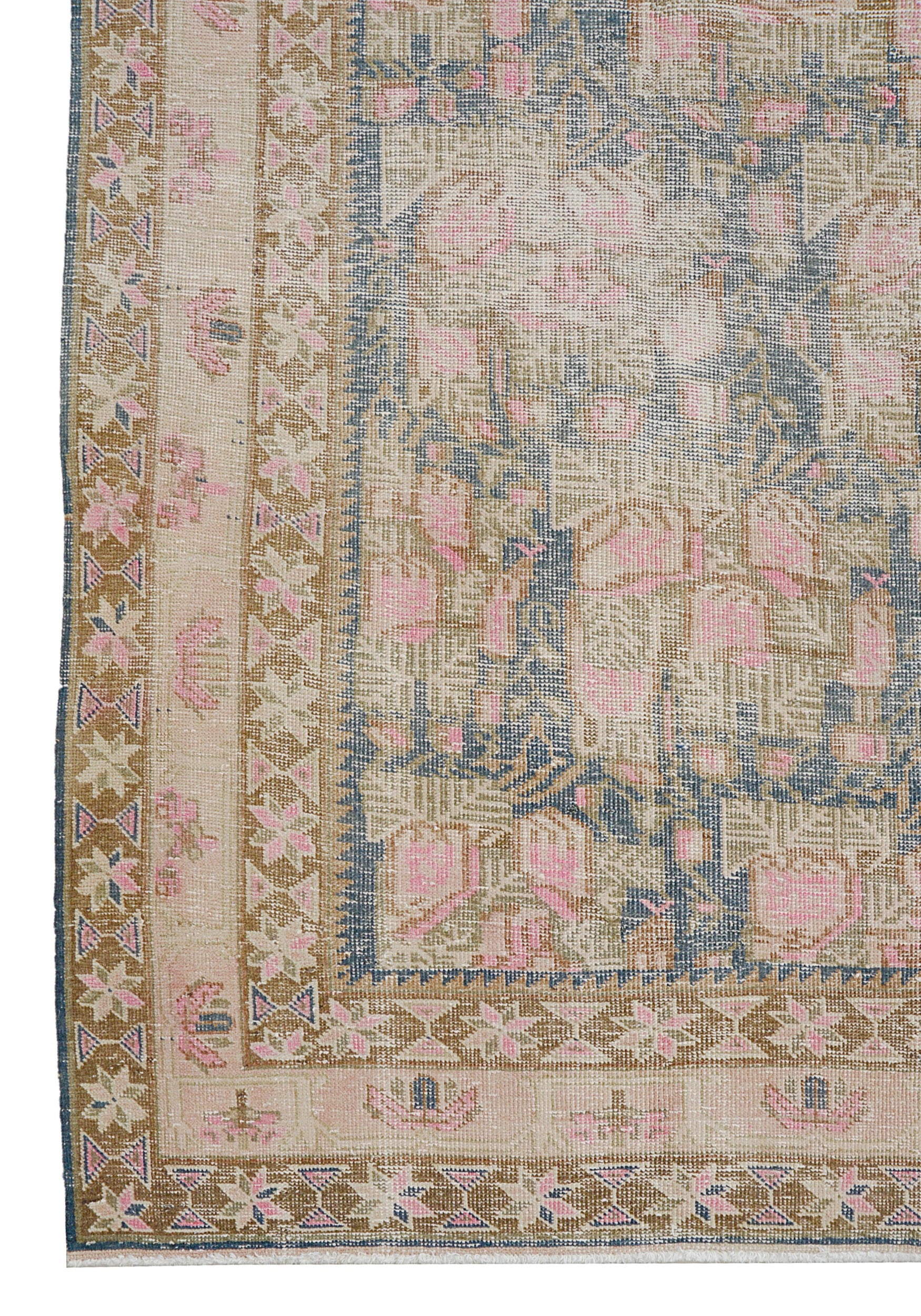 Vintage Persian Afshar rug corner detail showing hand-knotted wool texture and geometric border