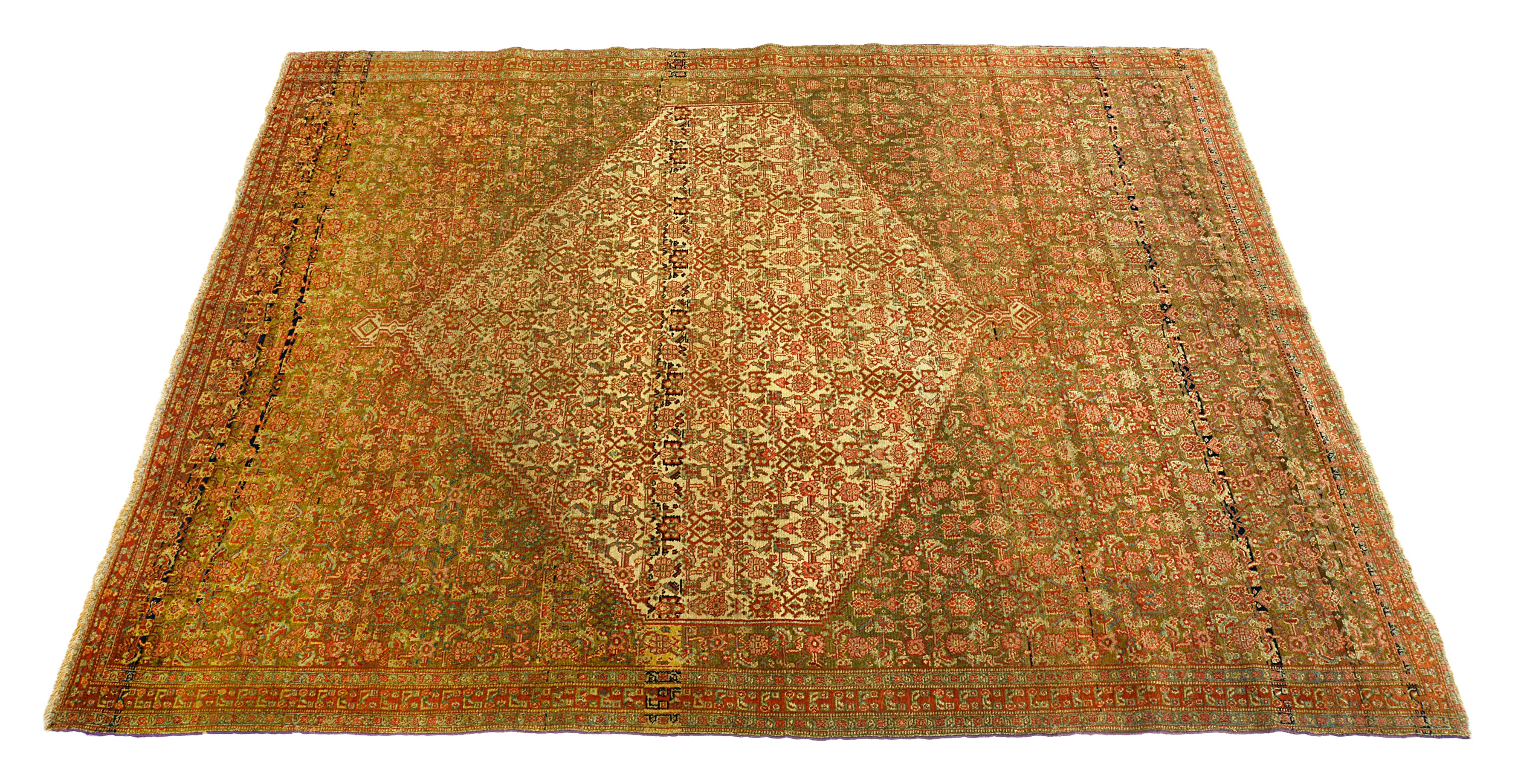 Antique Senneh rug with geometric pattern on a white background