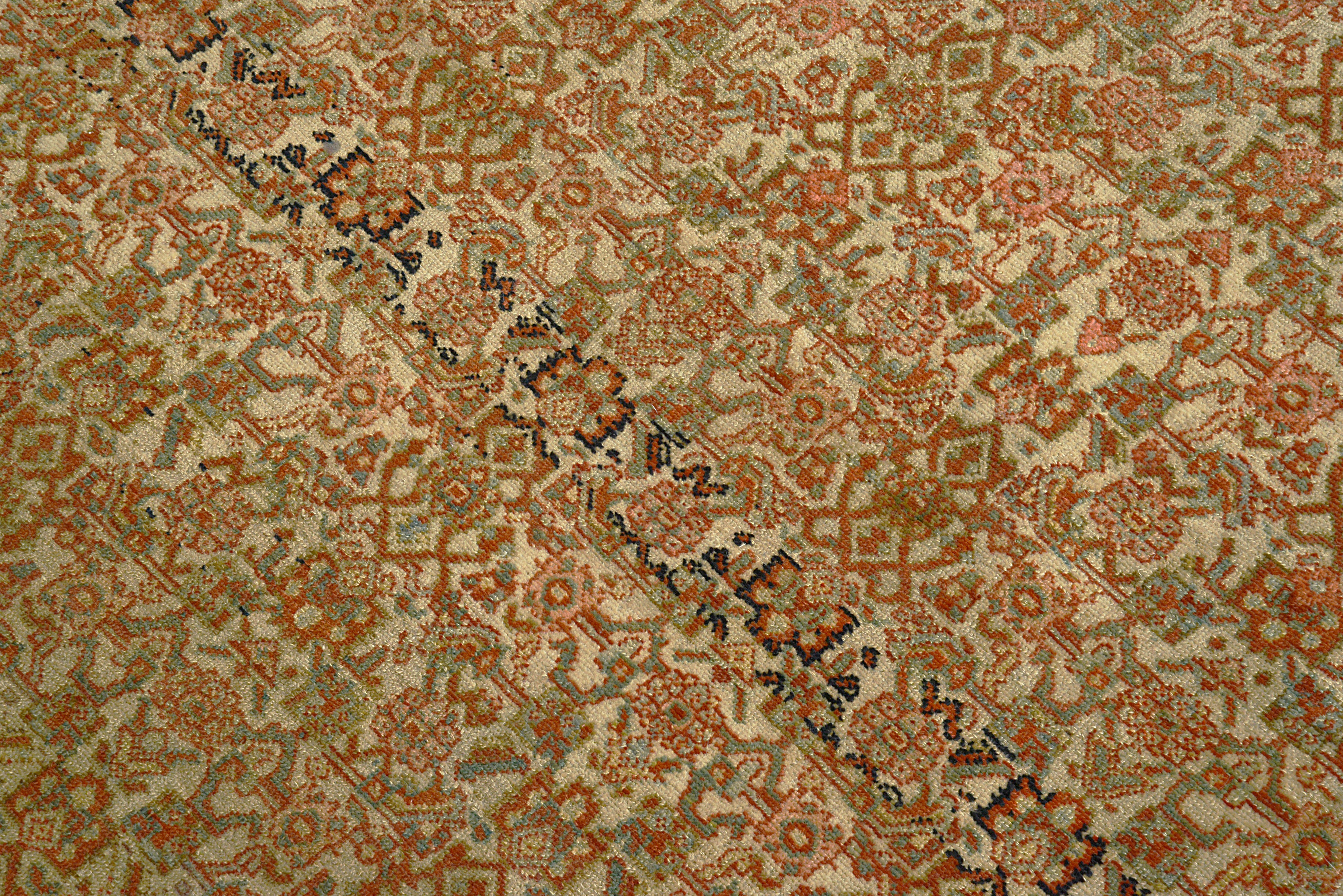 Close-up of a patterned Handmade Persian rug with earthy tones