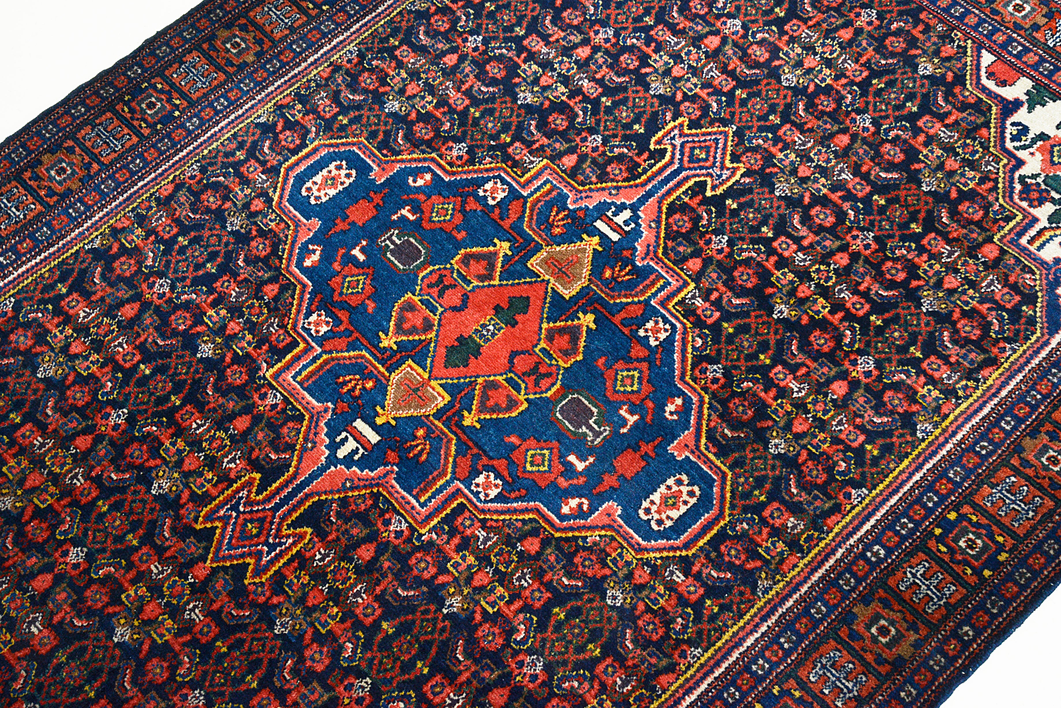 Close-up of a patterned rug with intricate designs