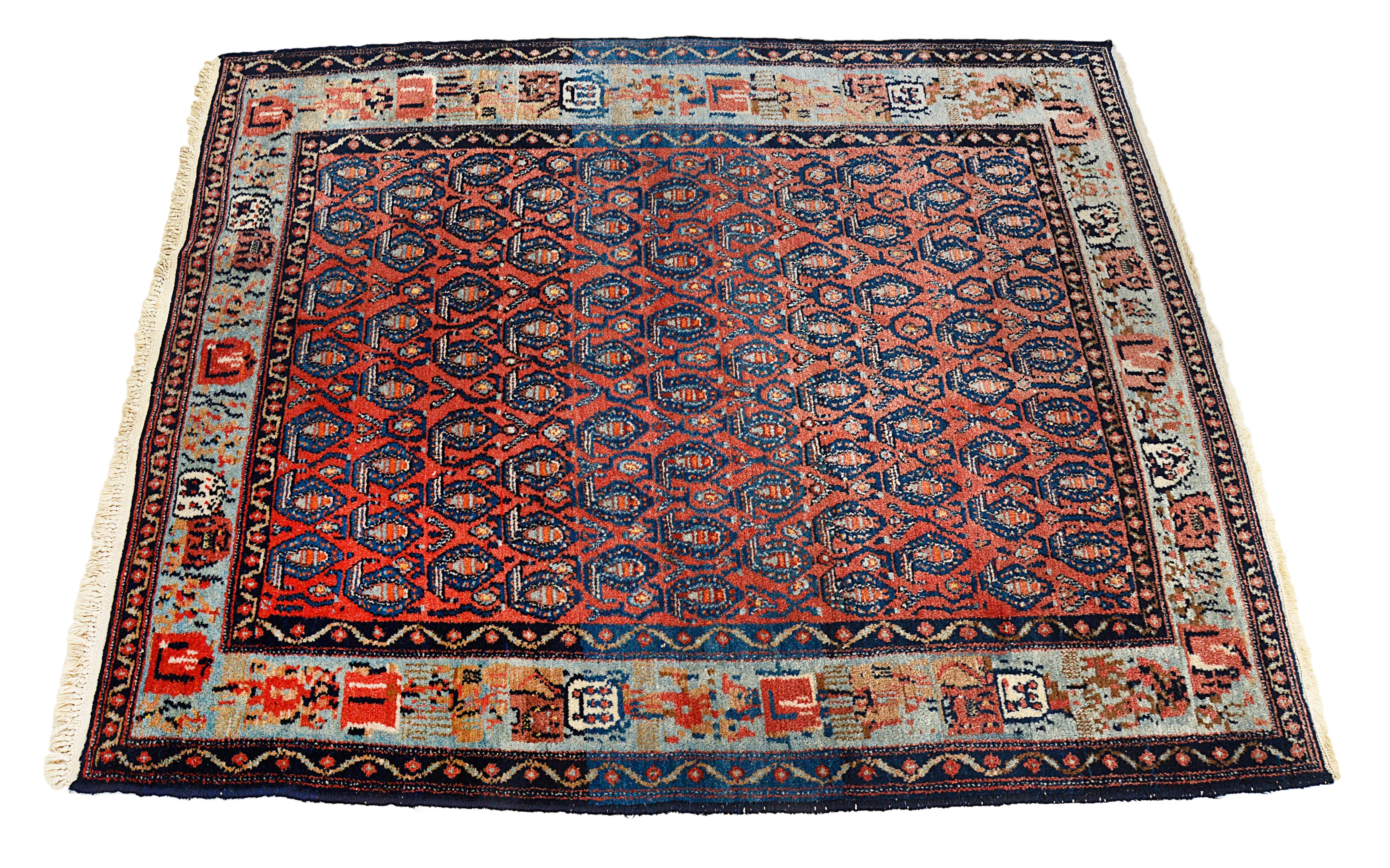 Close-up of the central field design on an antique Persian Senneh rug