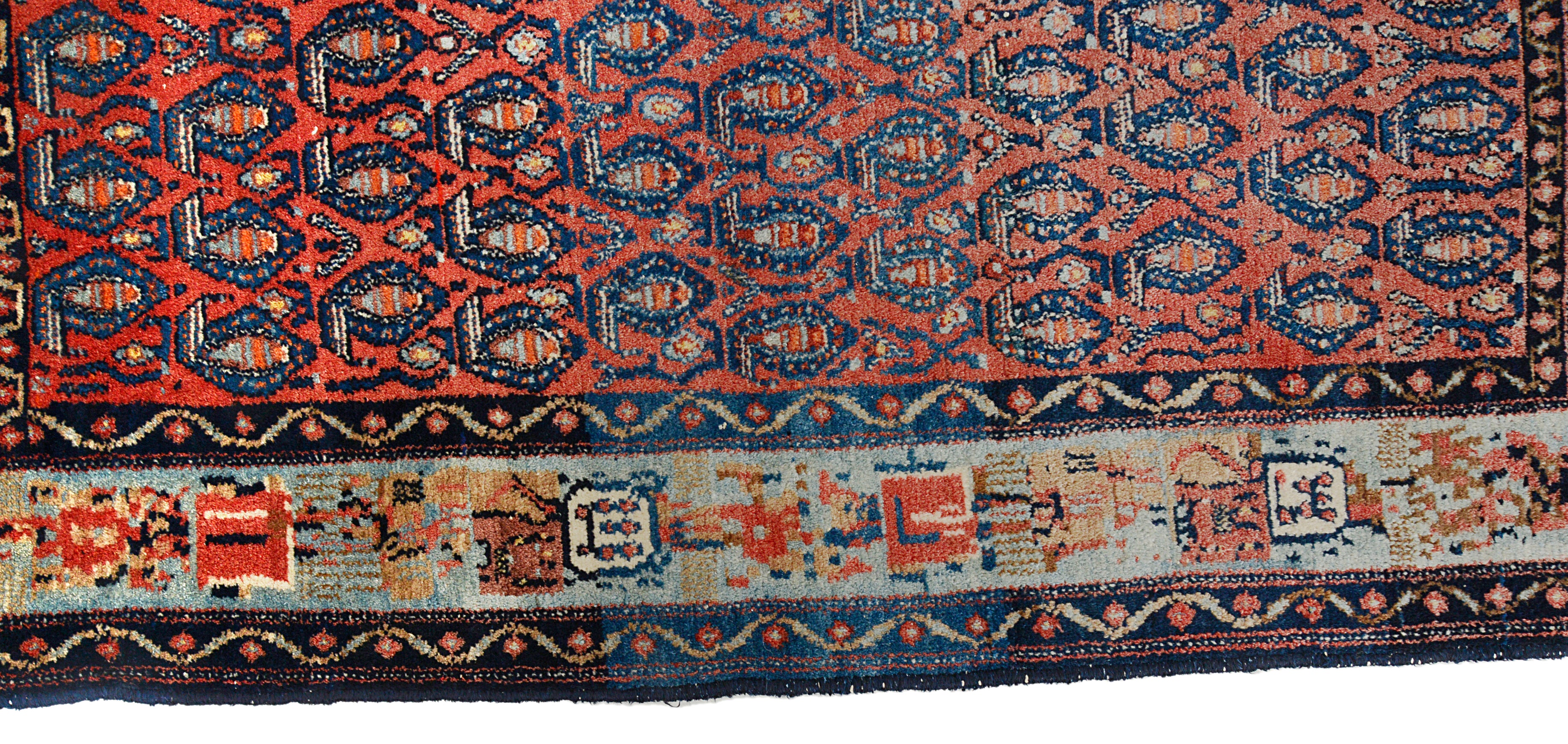 Traditional patterned Persian rug with intricate designs on a plain background