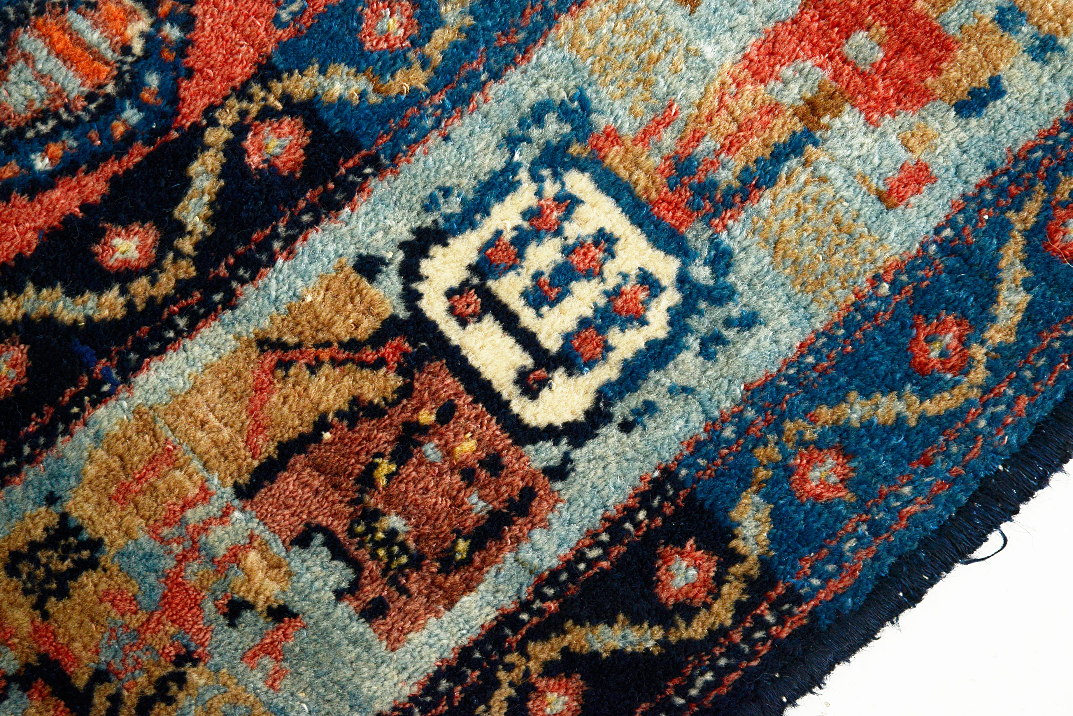 Border detail of an antique Persian Senneh rug