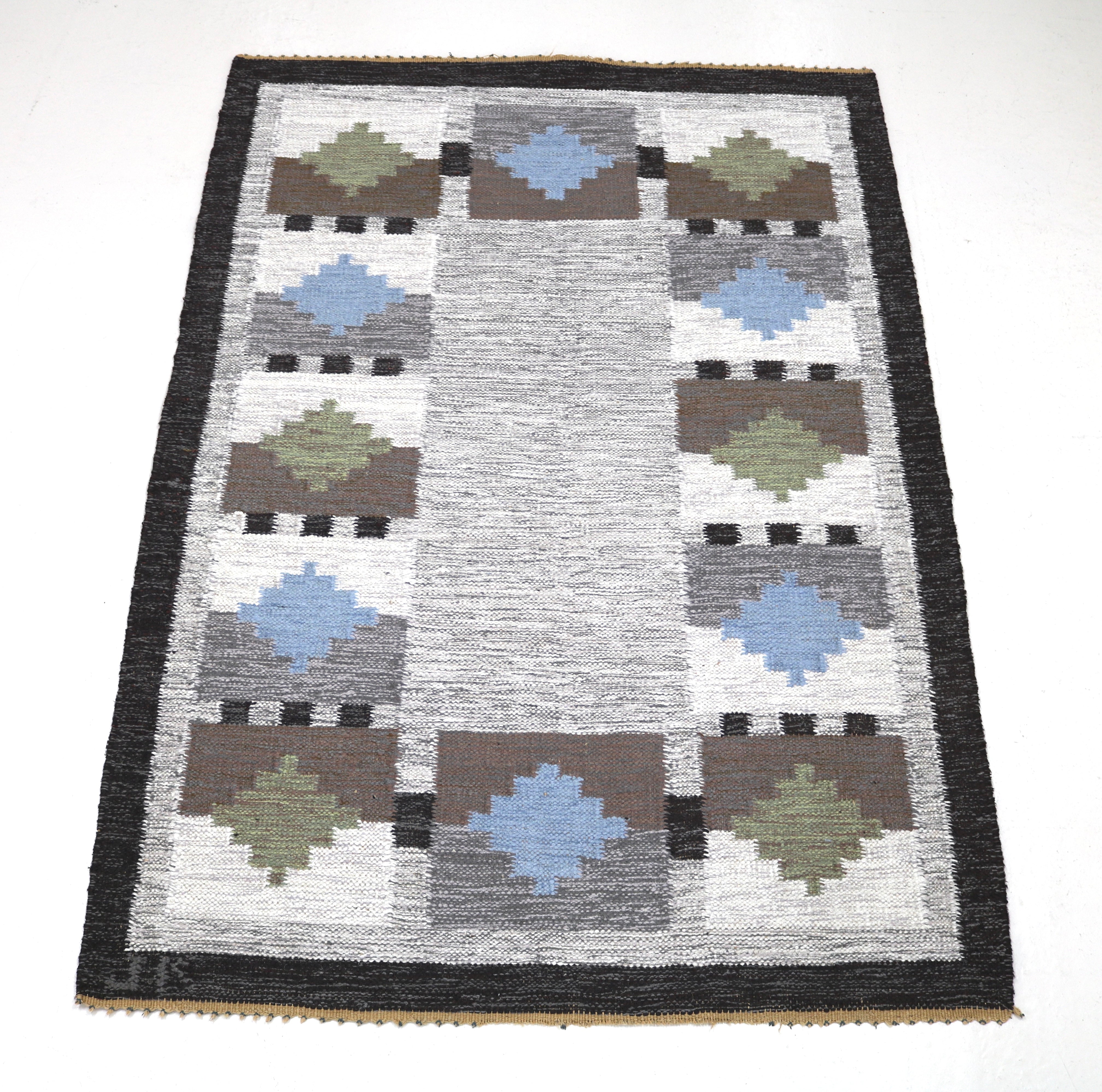 Handwoven vintage Swedish flatweave rug with Scandinavian geometric motifs