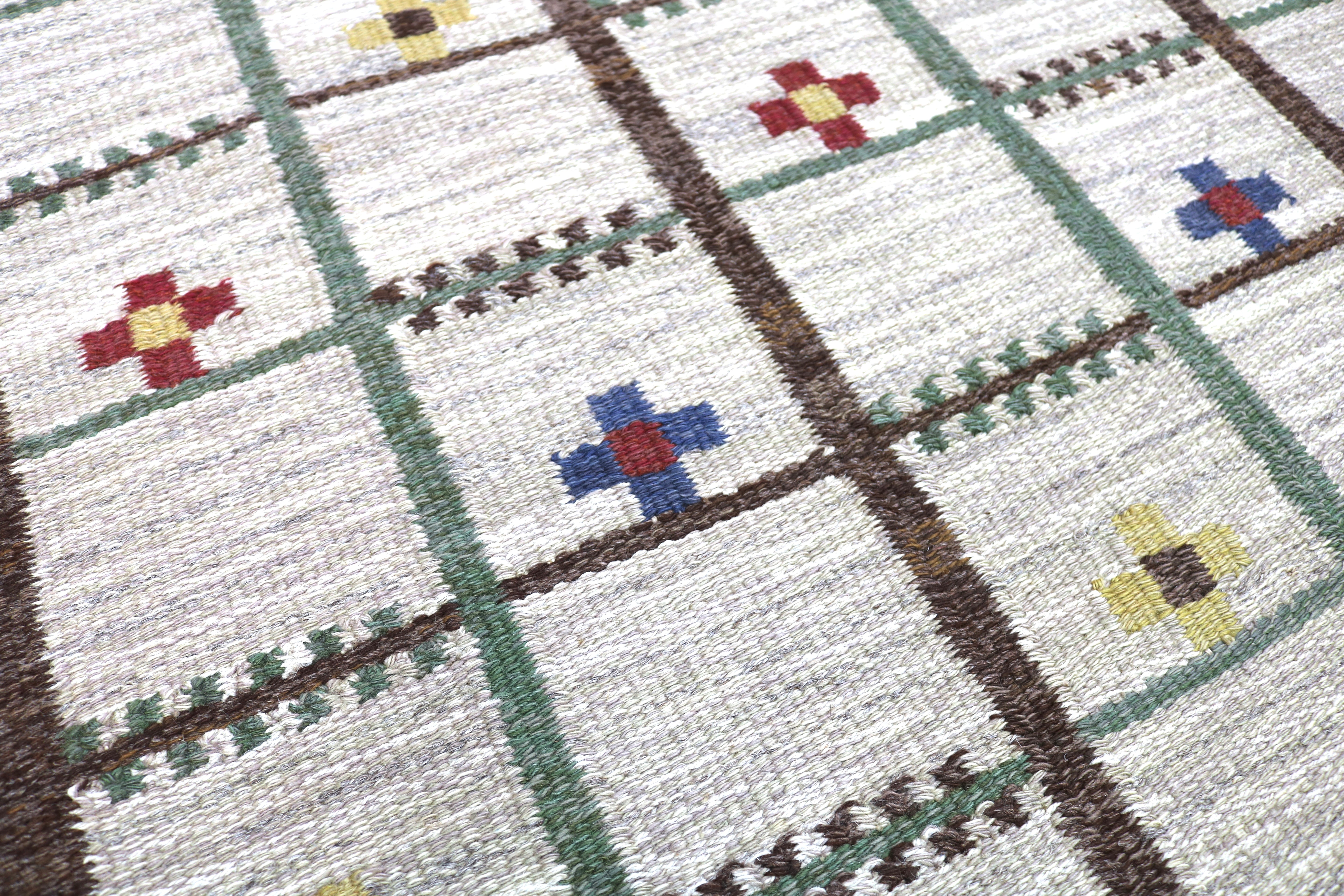 Close-up showing the fine wool texture and craftsmanship of a vintage Swedish rug.