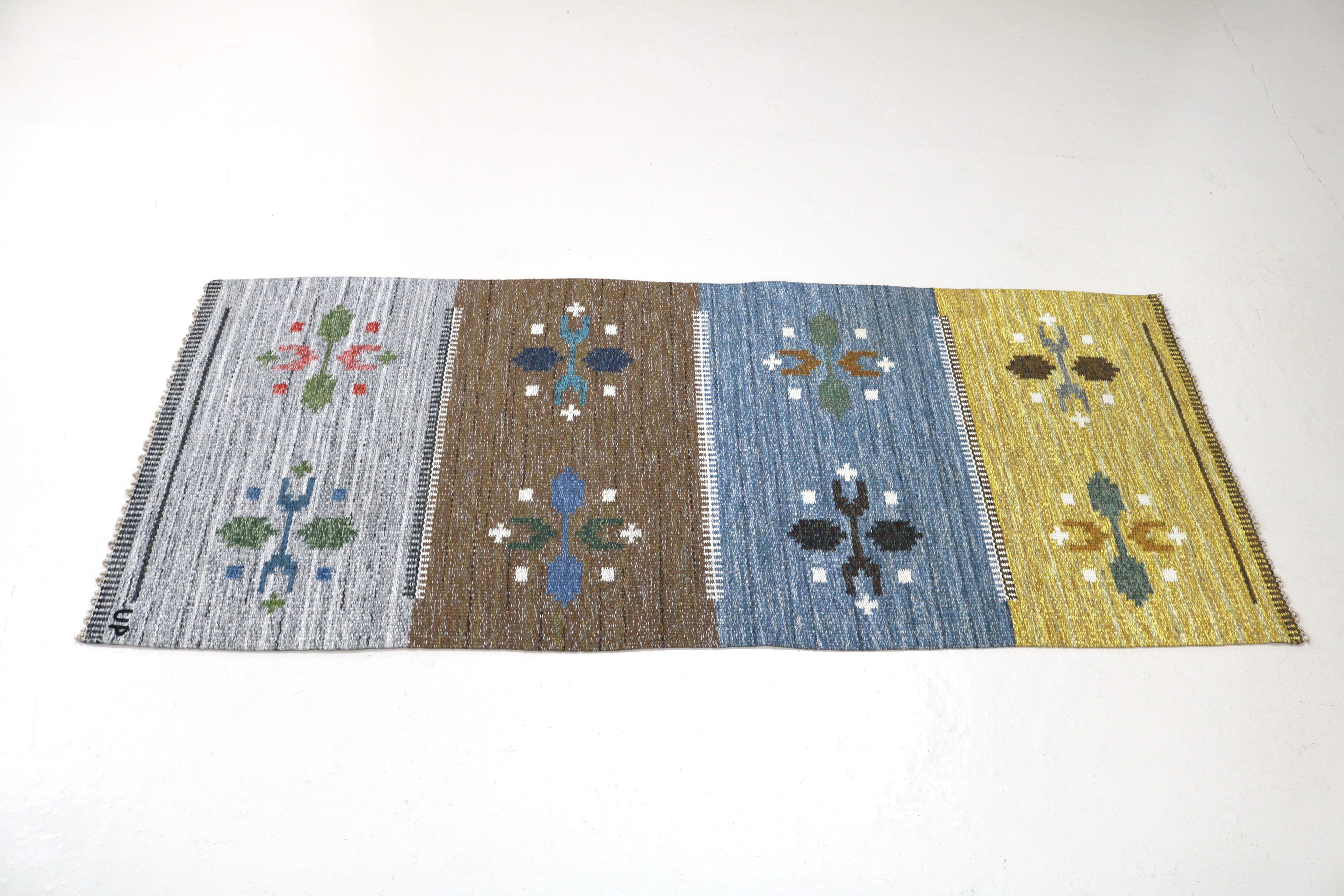 Vintage Swedish kilim runner, full length view highlighting balanced geometric design and natural tones