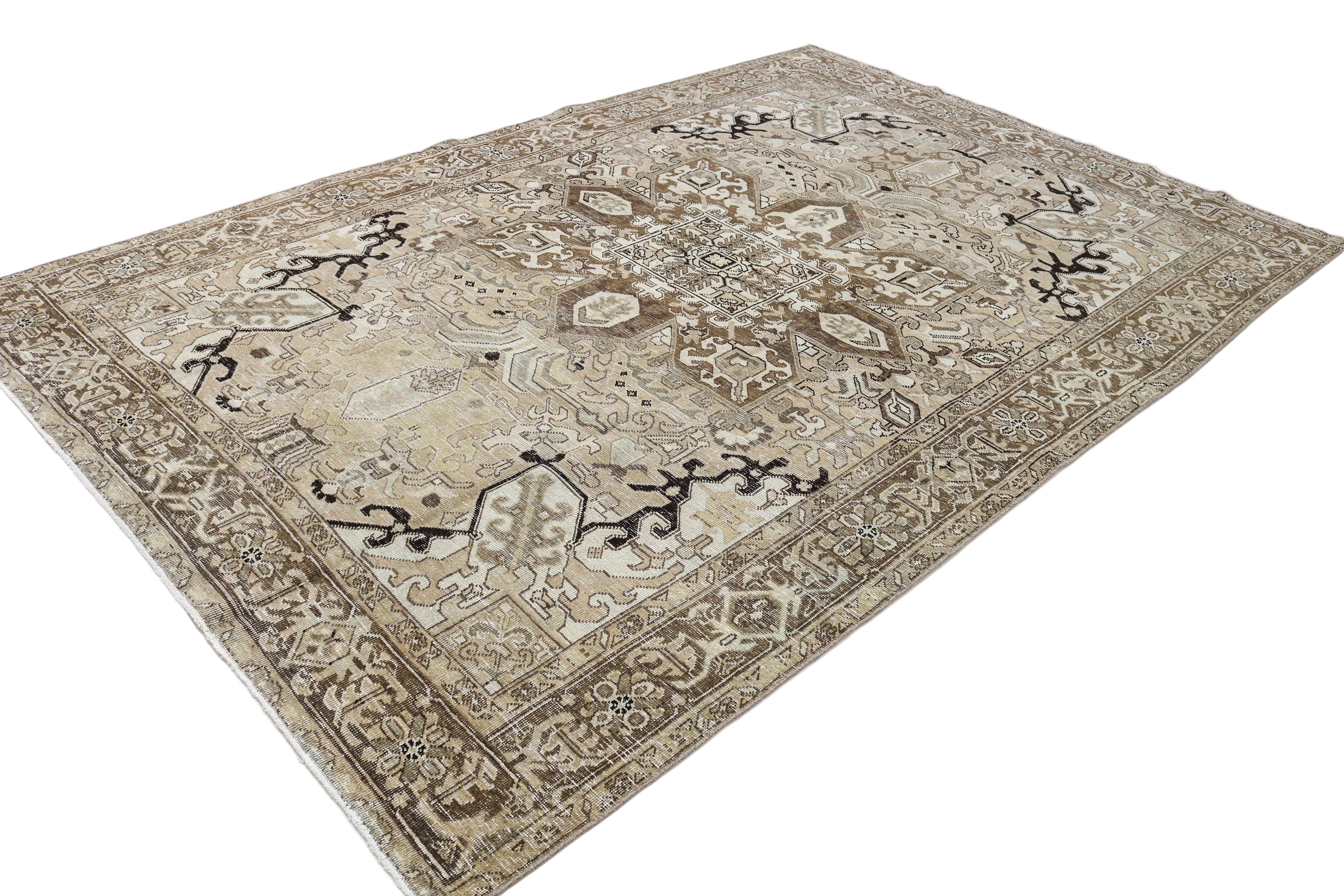 Hand-knotted vintage Persian rug with softly faded geometric pattern and muted natural colours