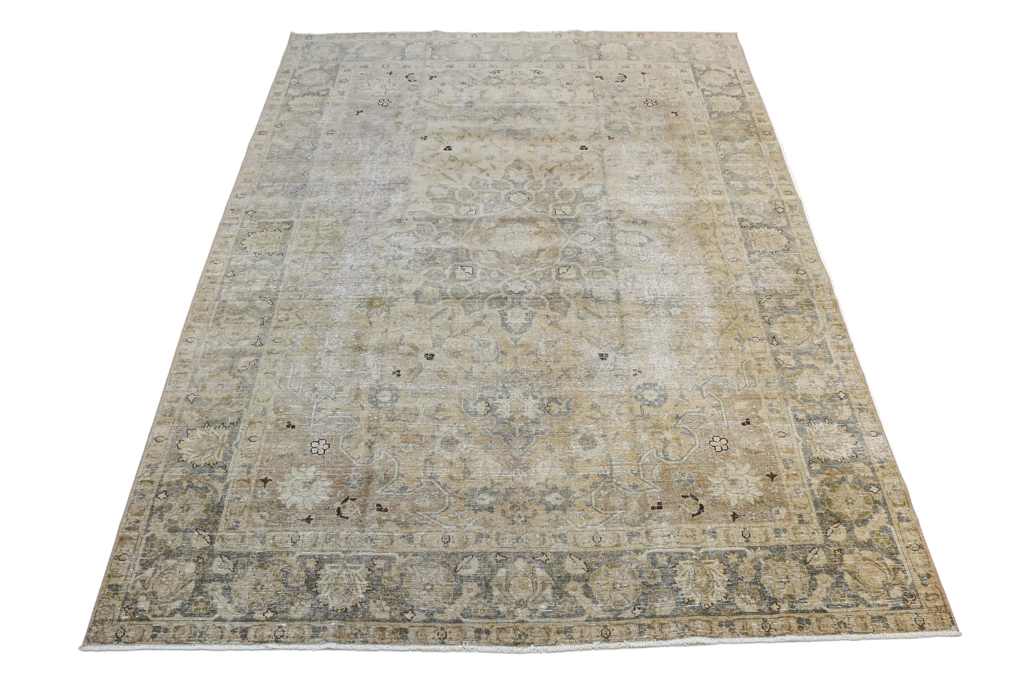 Large antique Persian Tabriz carpet with elegant floral design in ivory and muted beige tones