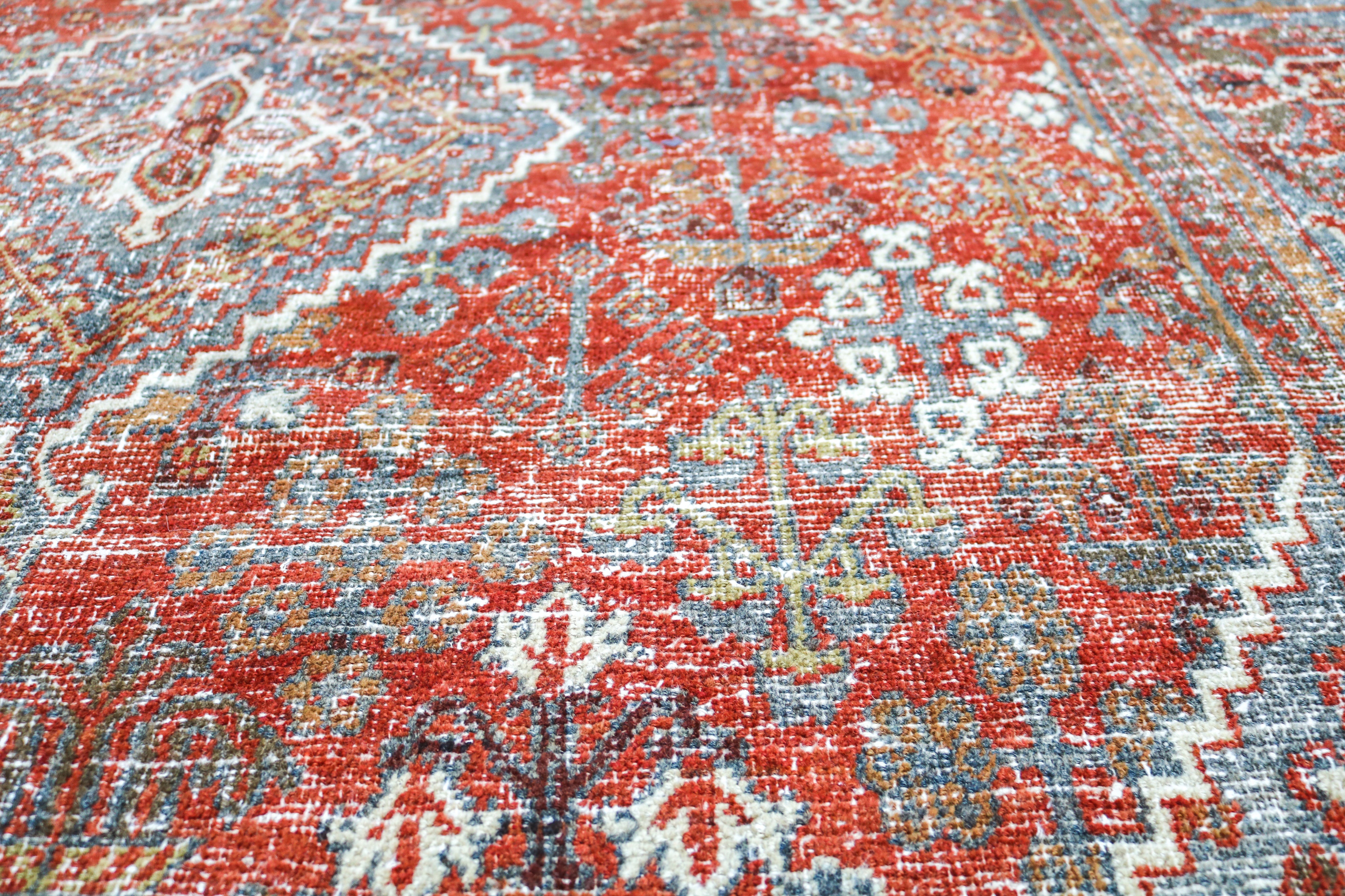 Handwoven Persian Josheqan rug detail with refined village drawing and naturally aged character
