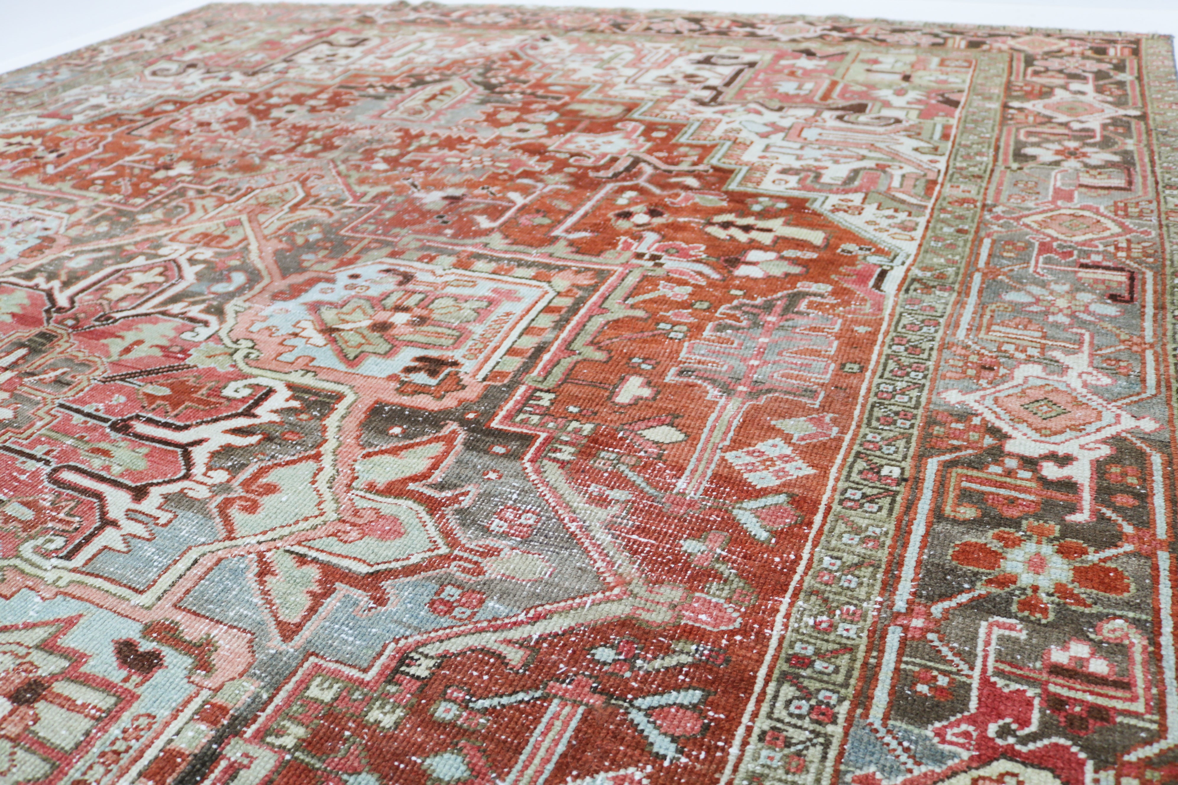 Antique Persian Heriz rug 340 × 240 cm, hand-knotted in wool, circa 1920